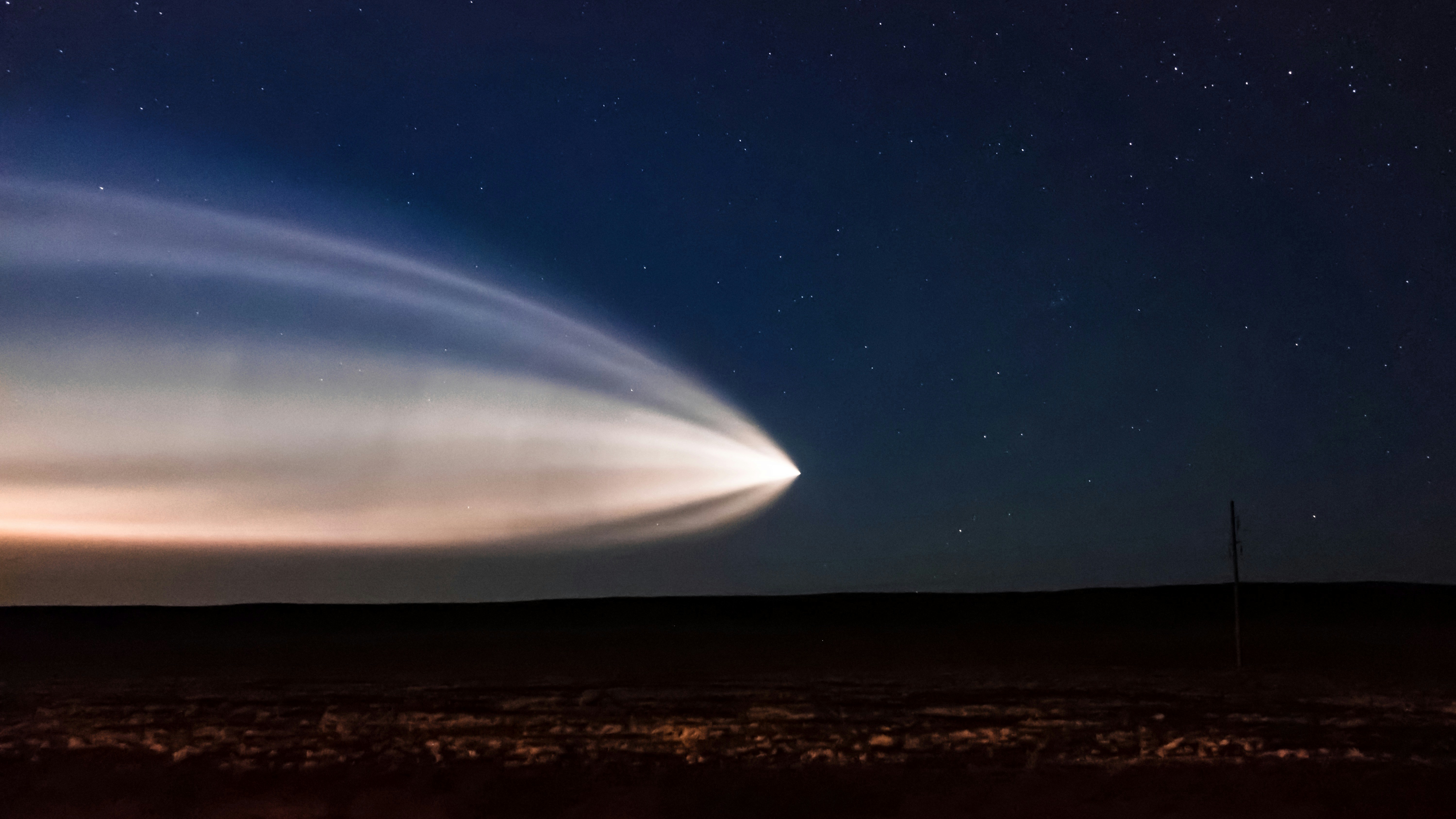 Bright Comet over Night Wilderness