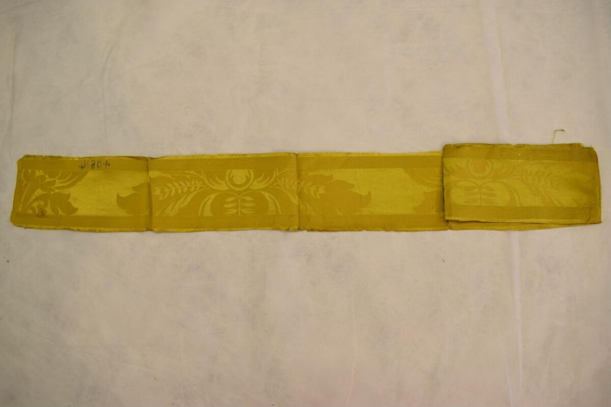 Folded Yellow Patterned Fabric Strip