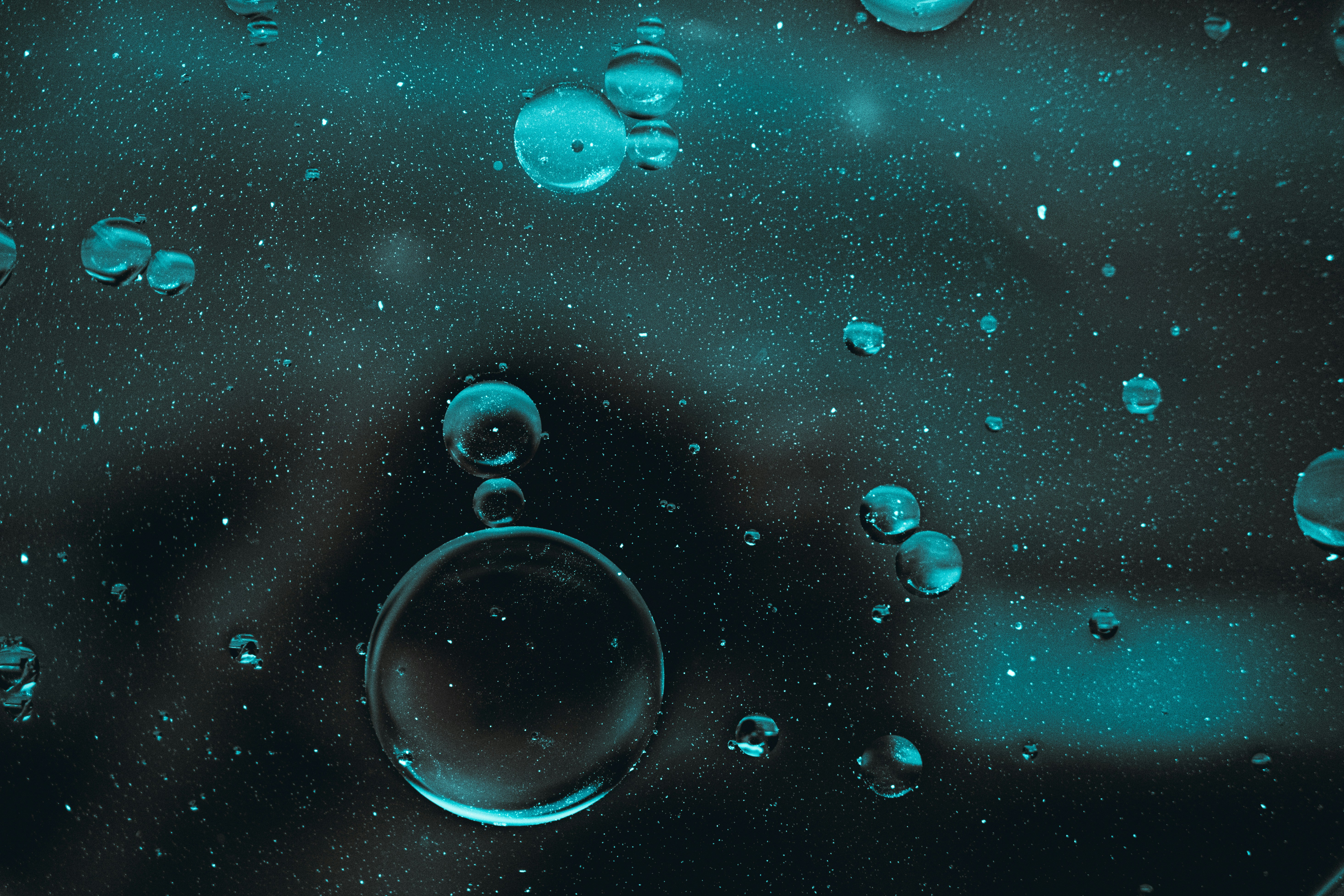 Close-up of Teal Bubbles in Liquid
