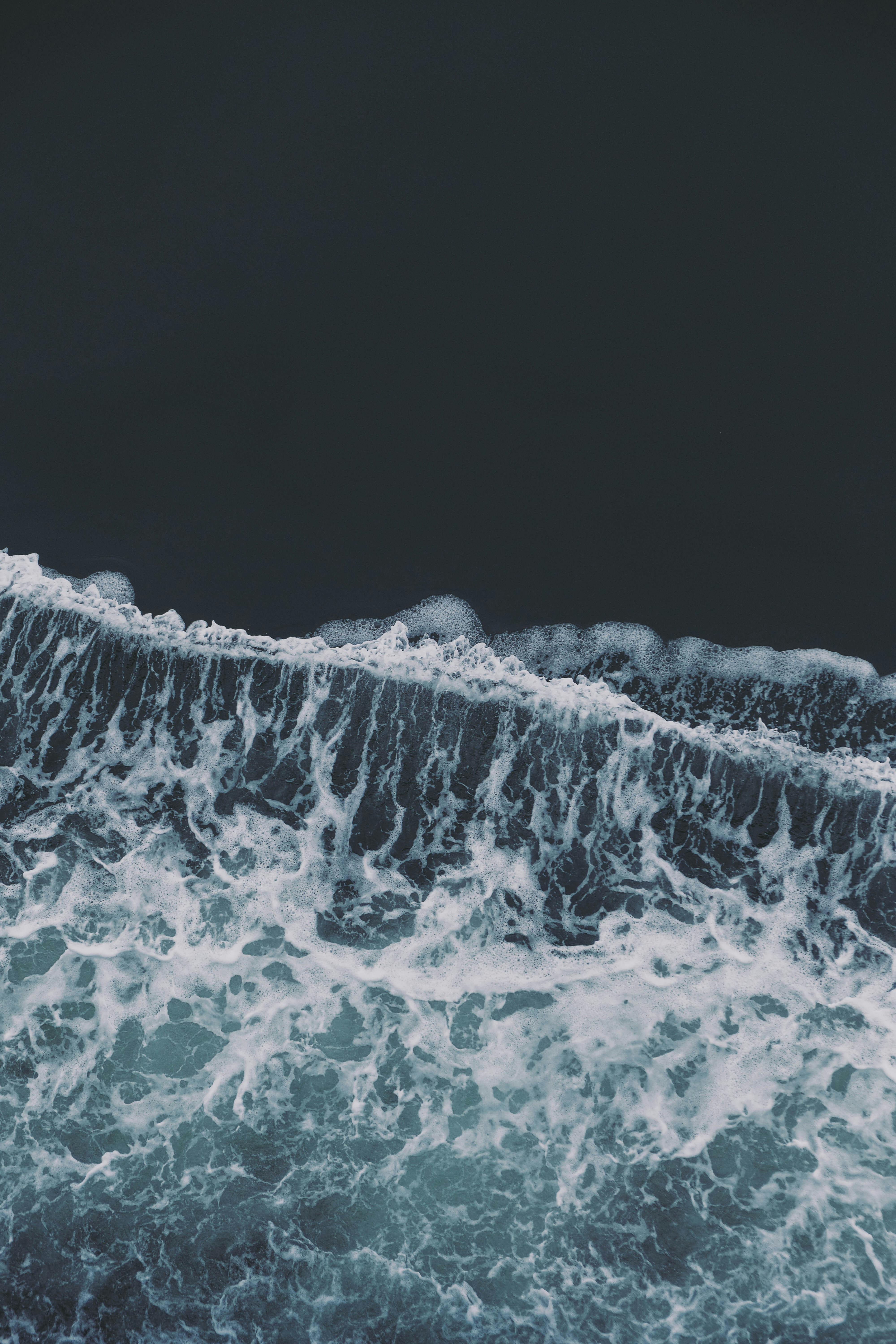 Breaking Wave in Dark Ocean