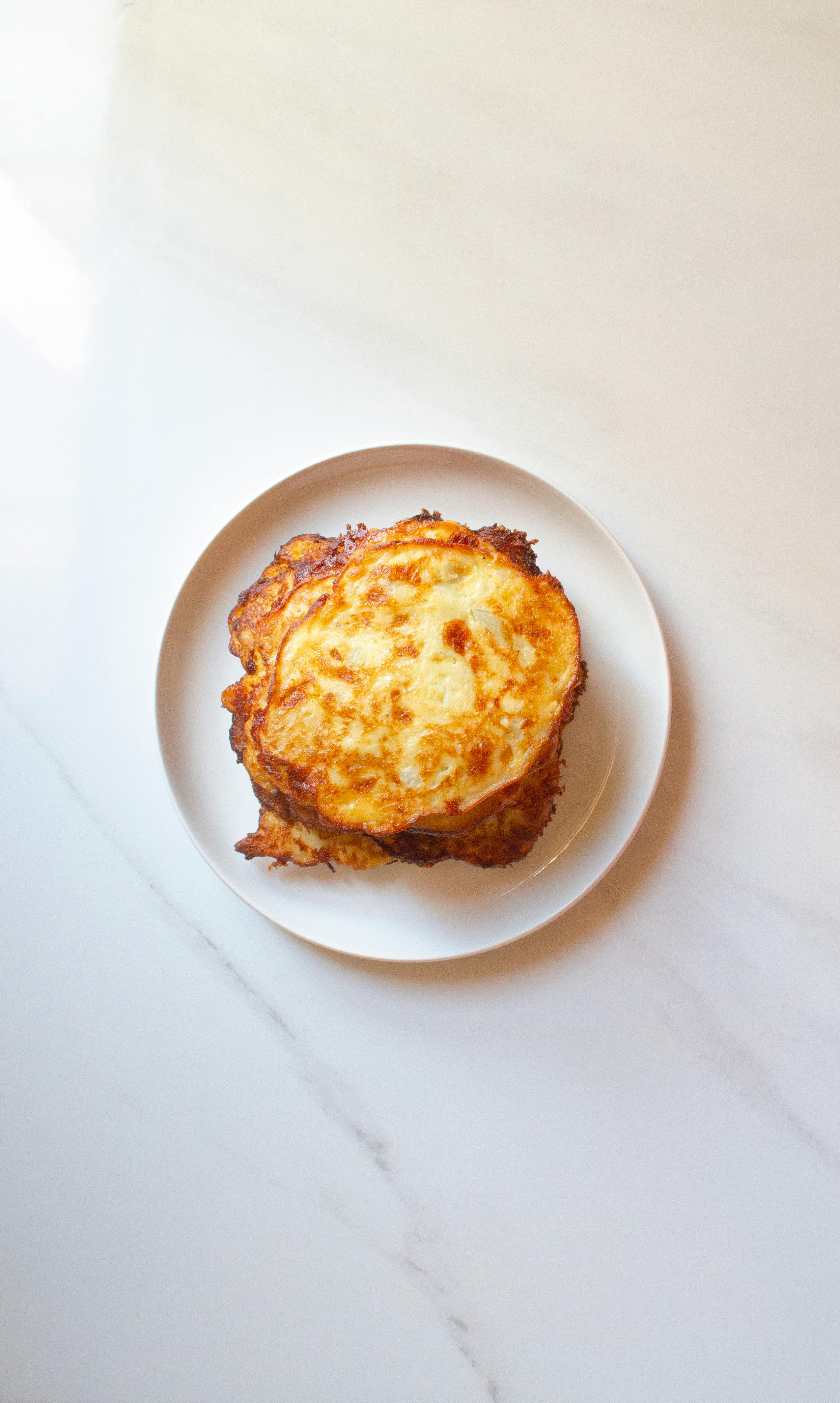 Stack of French Toast on White Plate