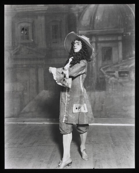 Actor in Period Costume on Theatre Stage