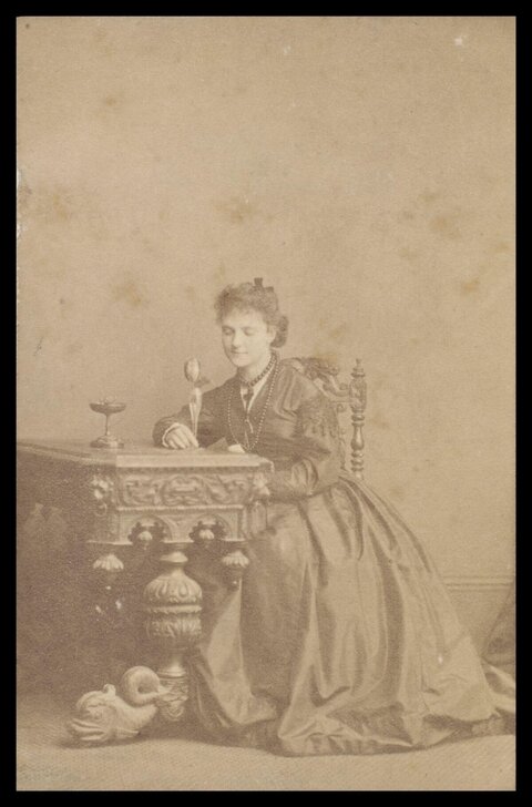 Vintage Portrait of Woman at Carved Table