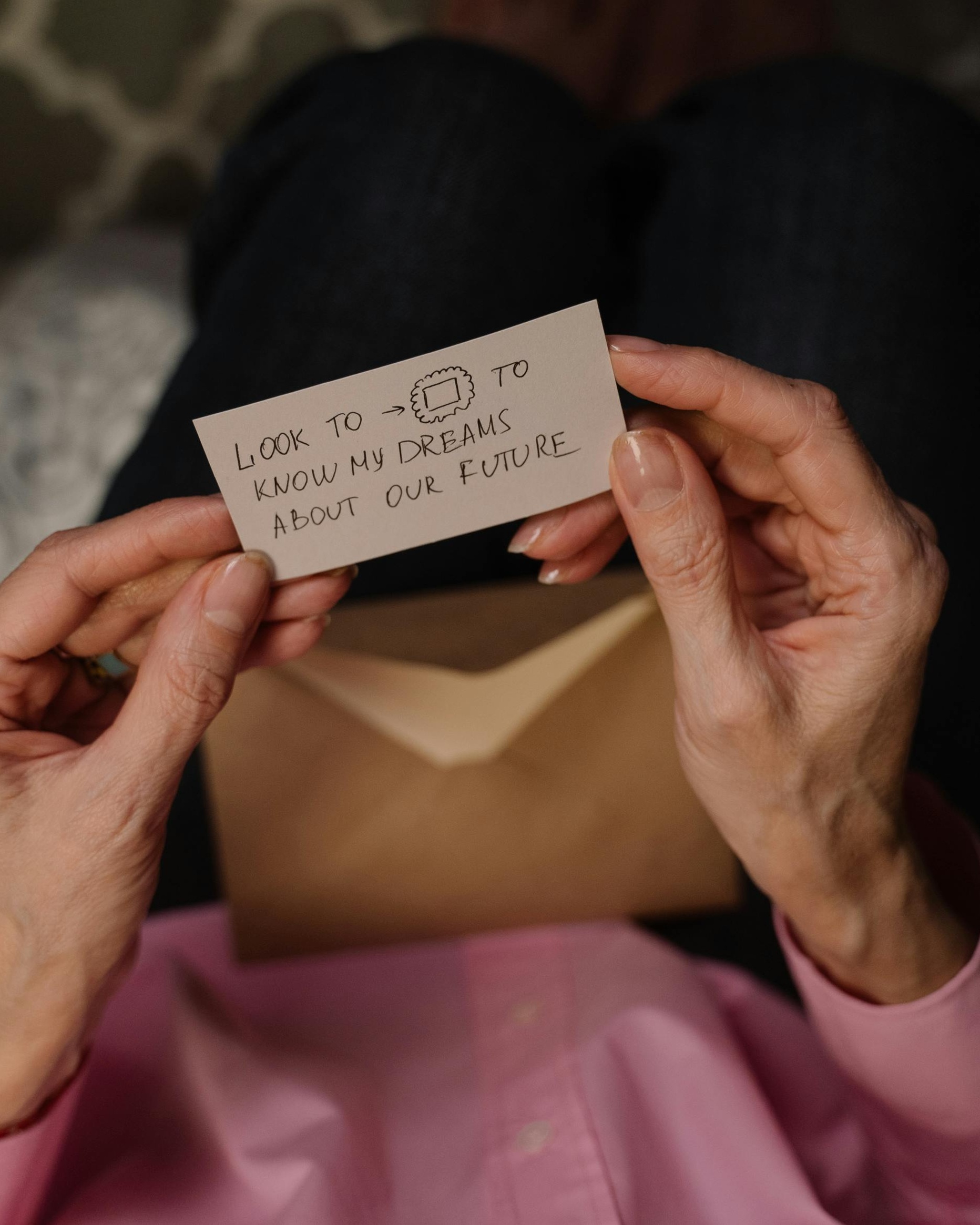 Hands Holding Handwritten Romantic Note
