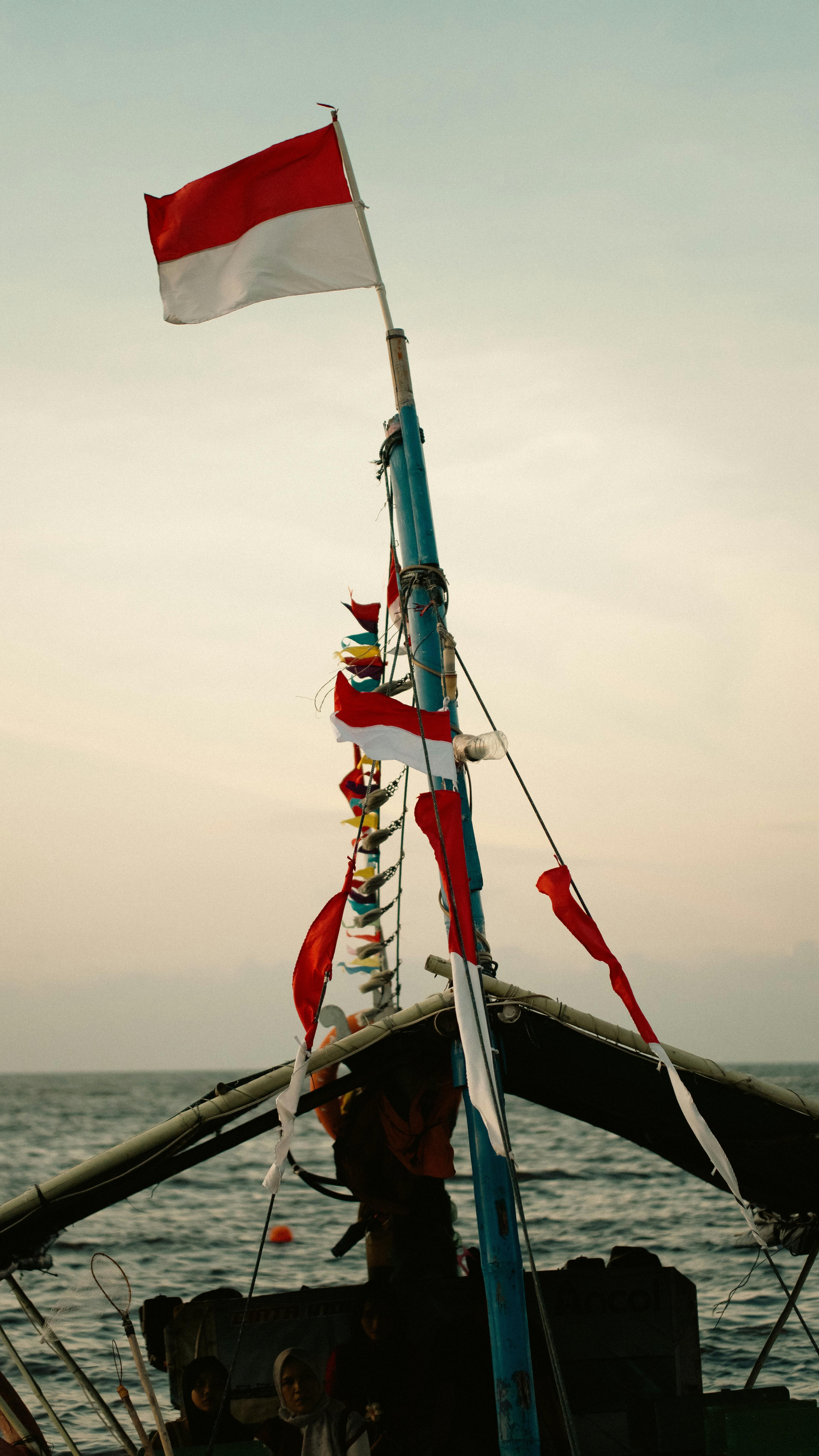 Indonesian Flag on Fishing Boat at Sea