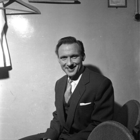 Smiling Man in Suit Black and White Portrait