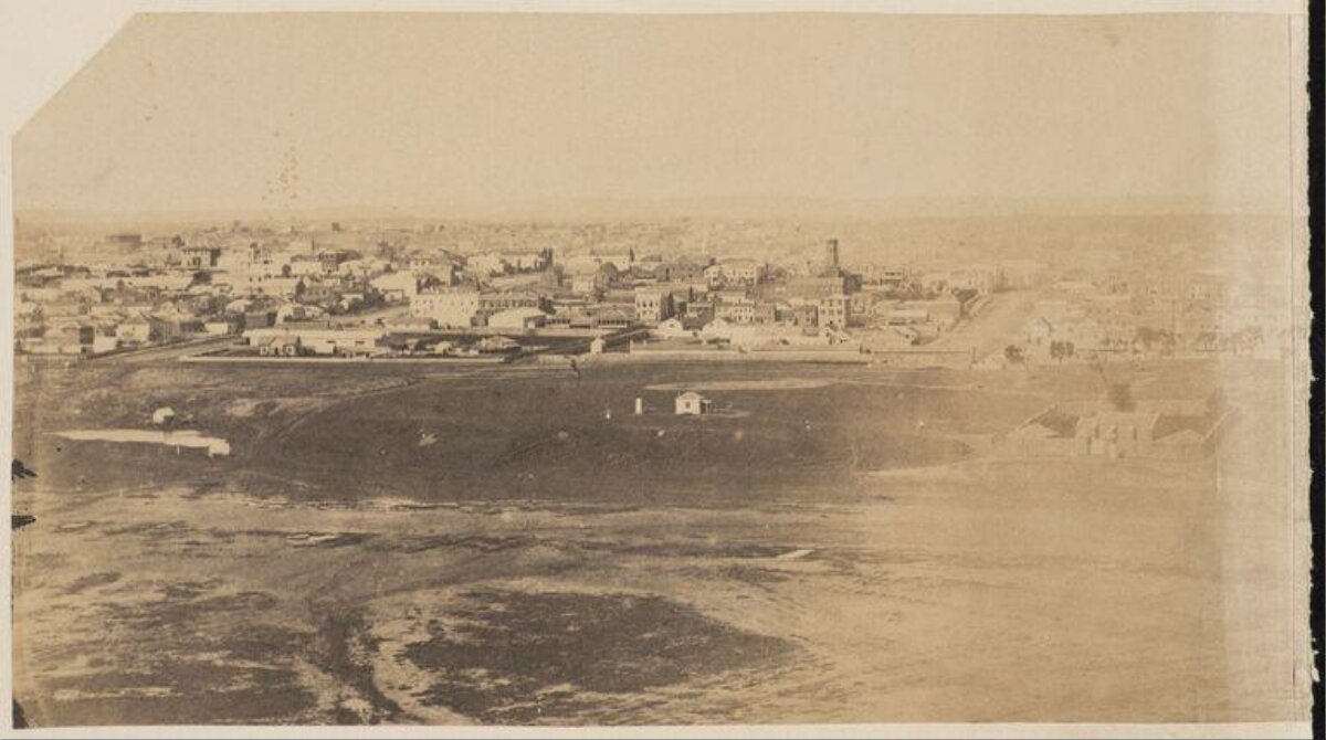 Vintage Aerial View of Coastal City
