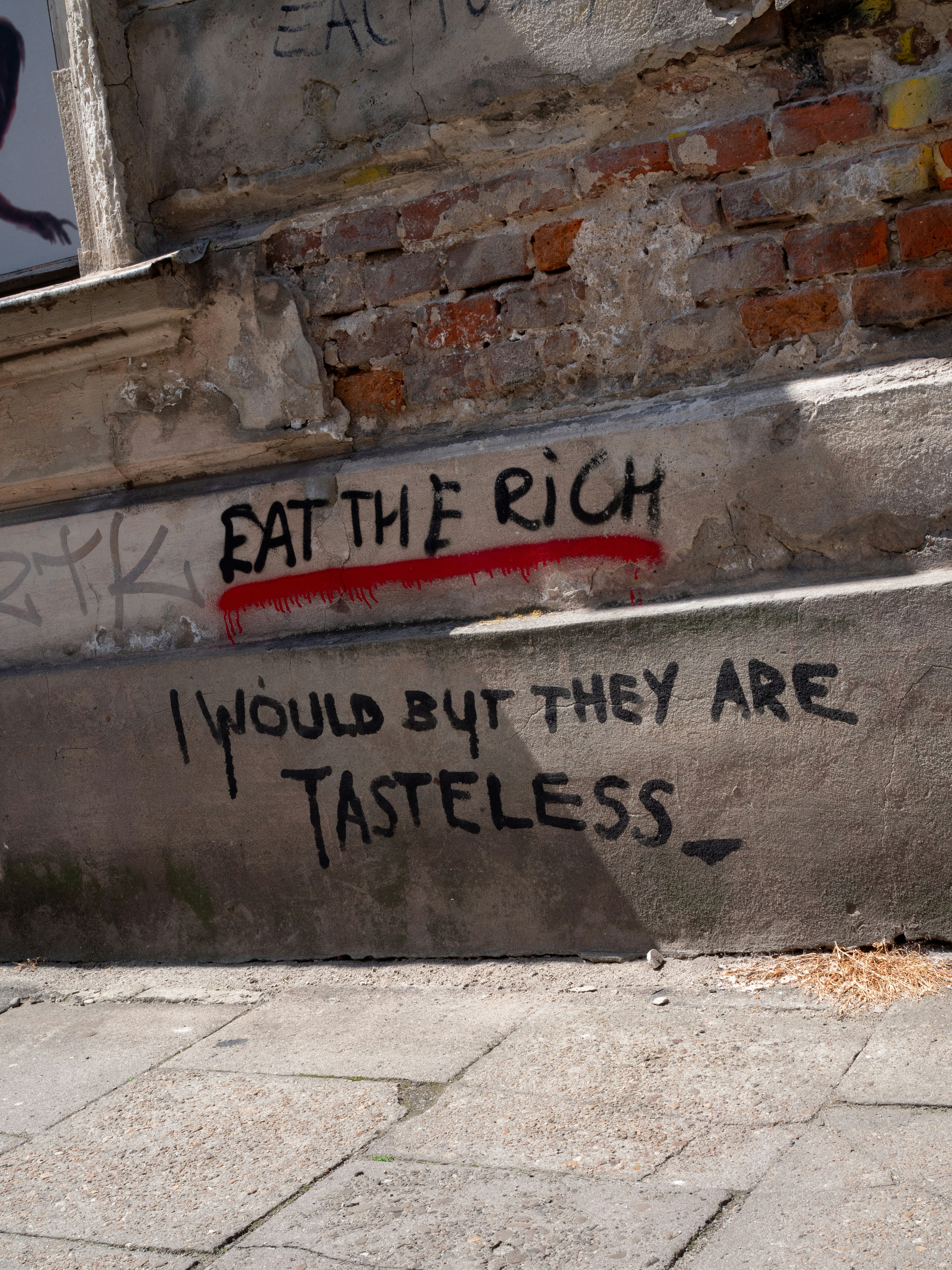 Satirical Eat the Rich Street Graffiti