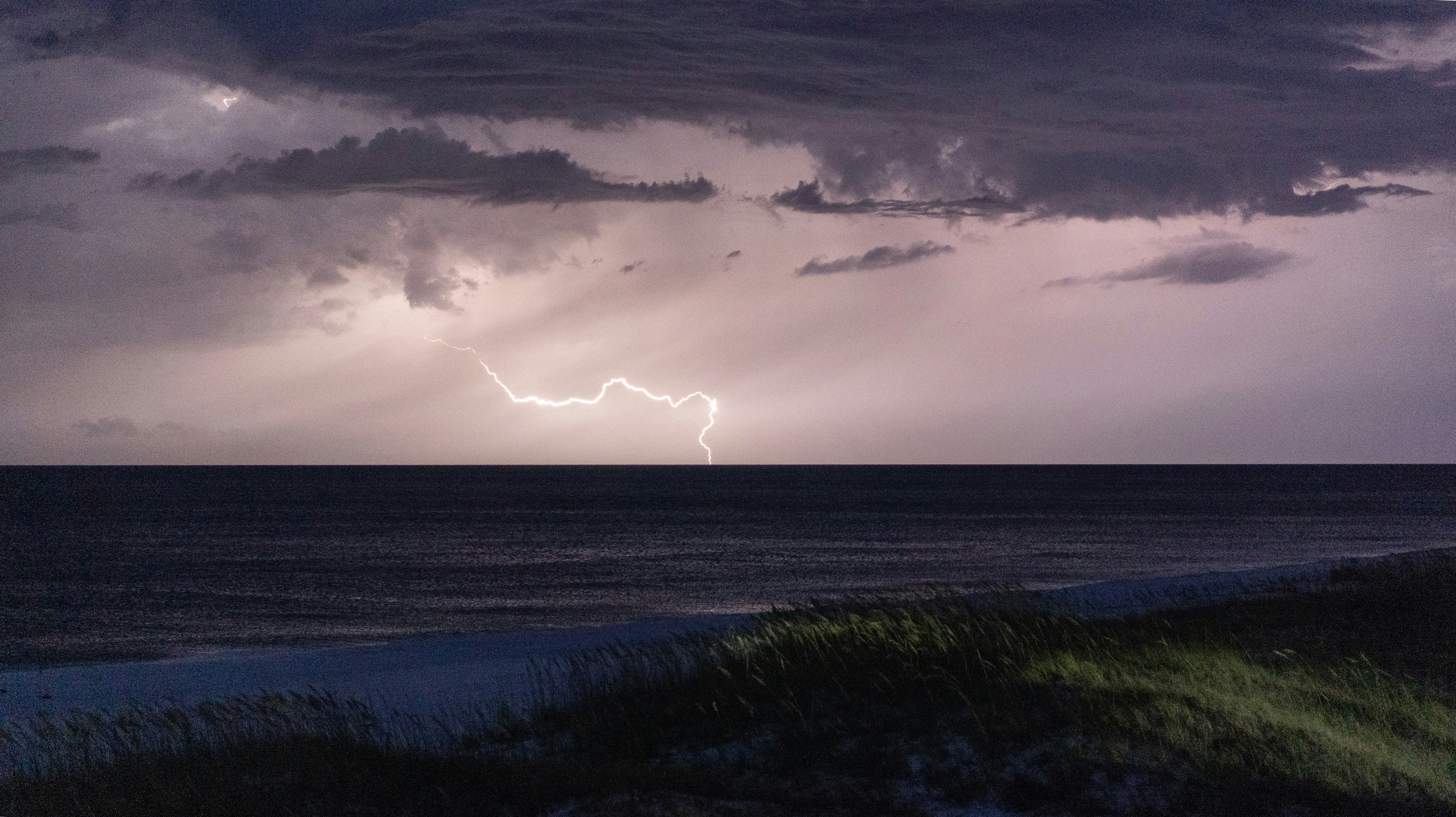 Lightning Over Ocean at Beach