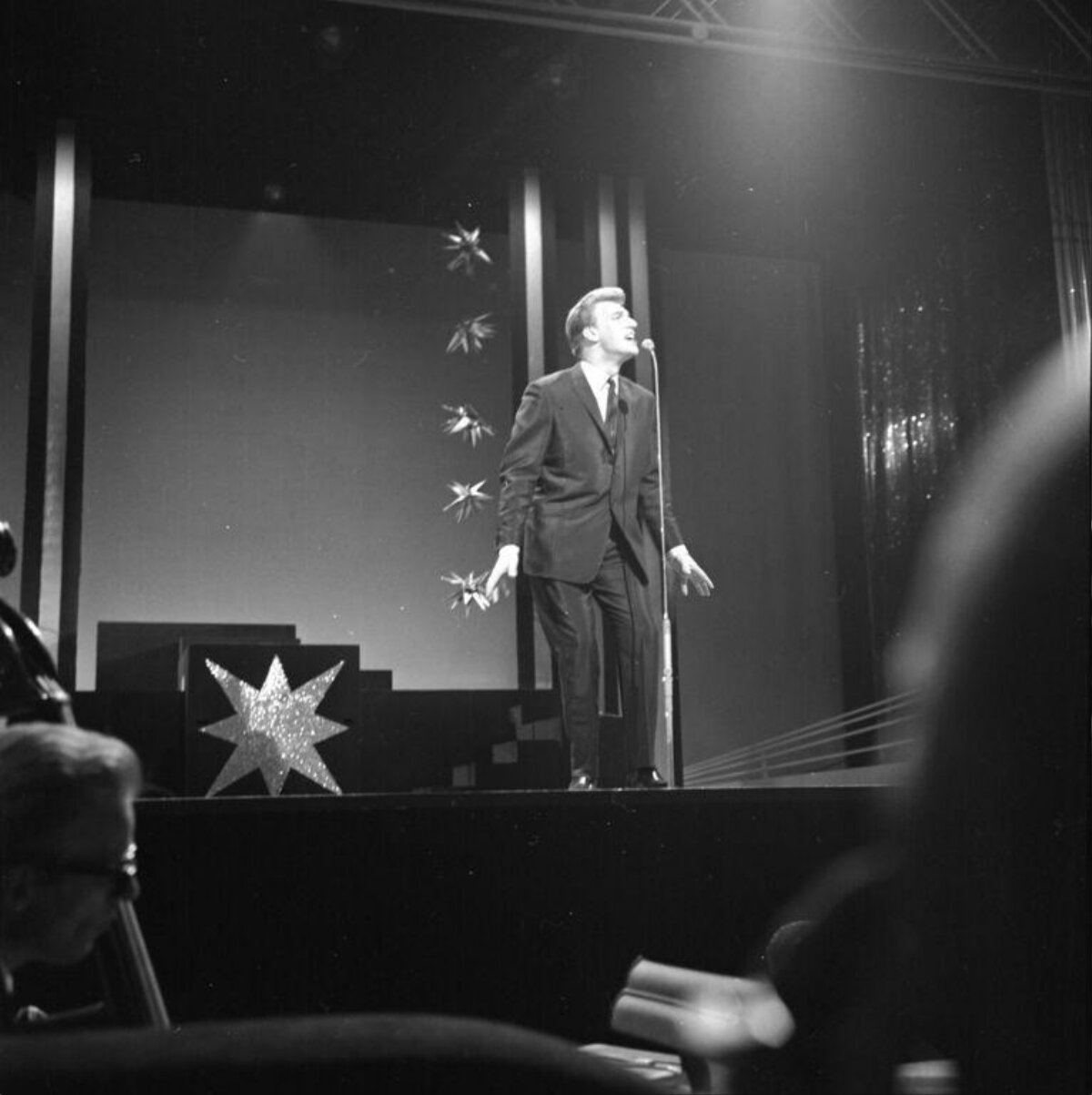 Male Singer Performing on Stage