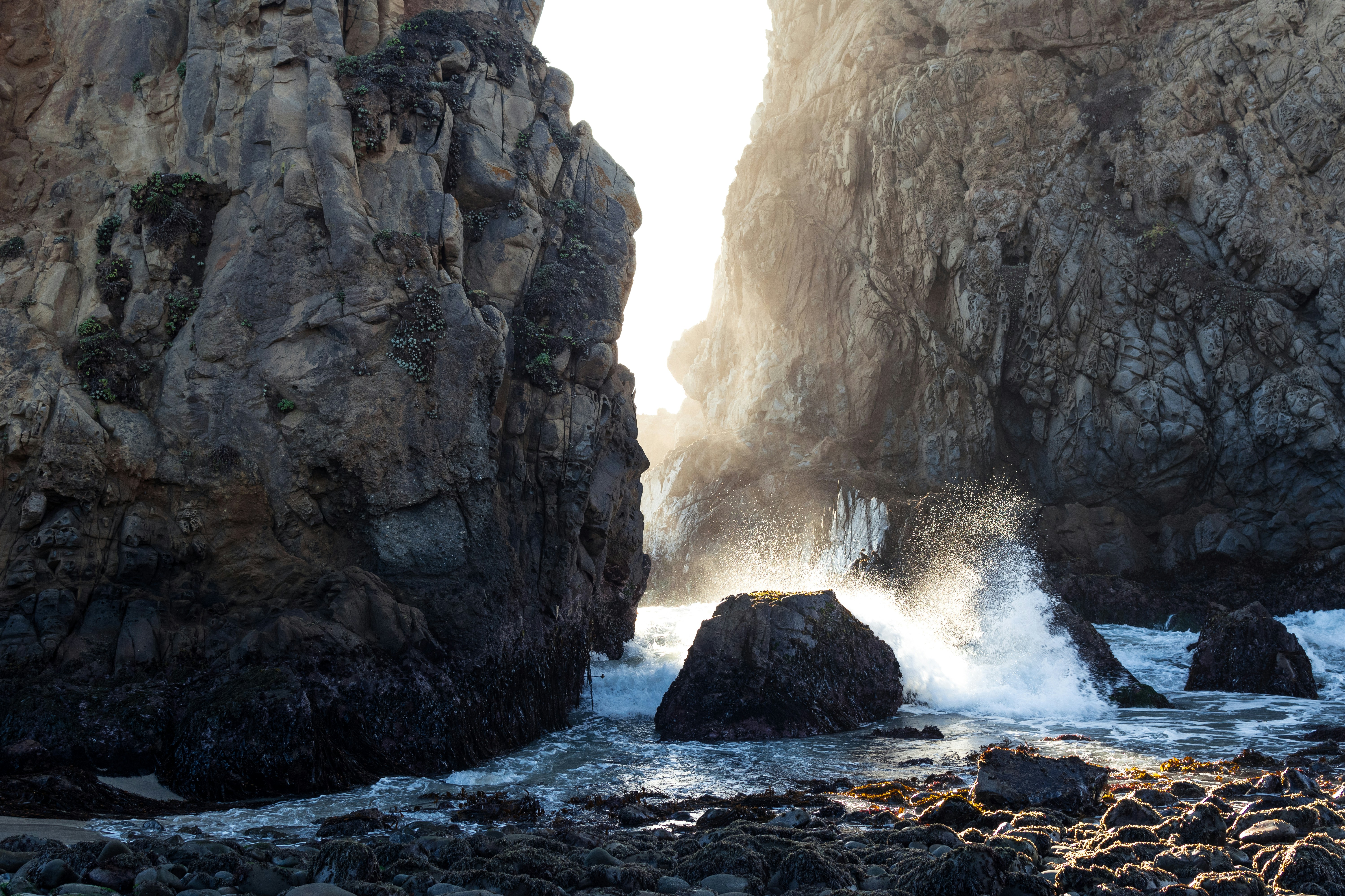 Waves Crashing Between Coastal Cliffs