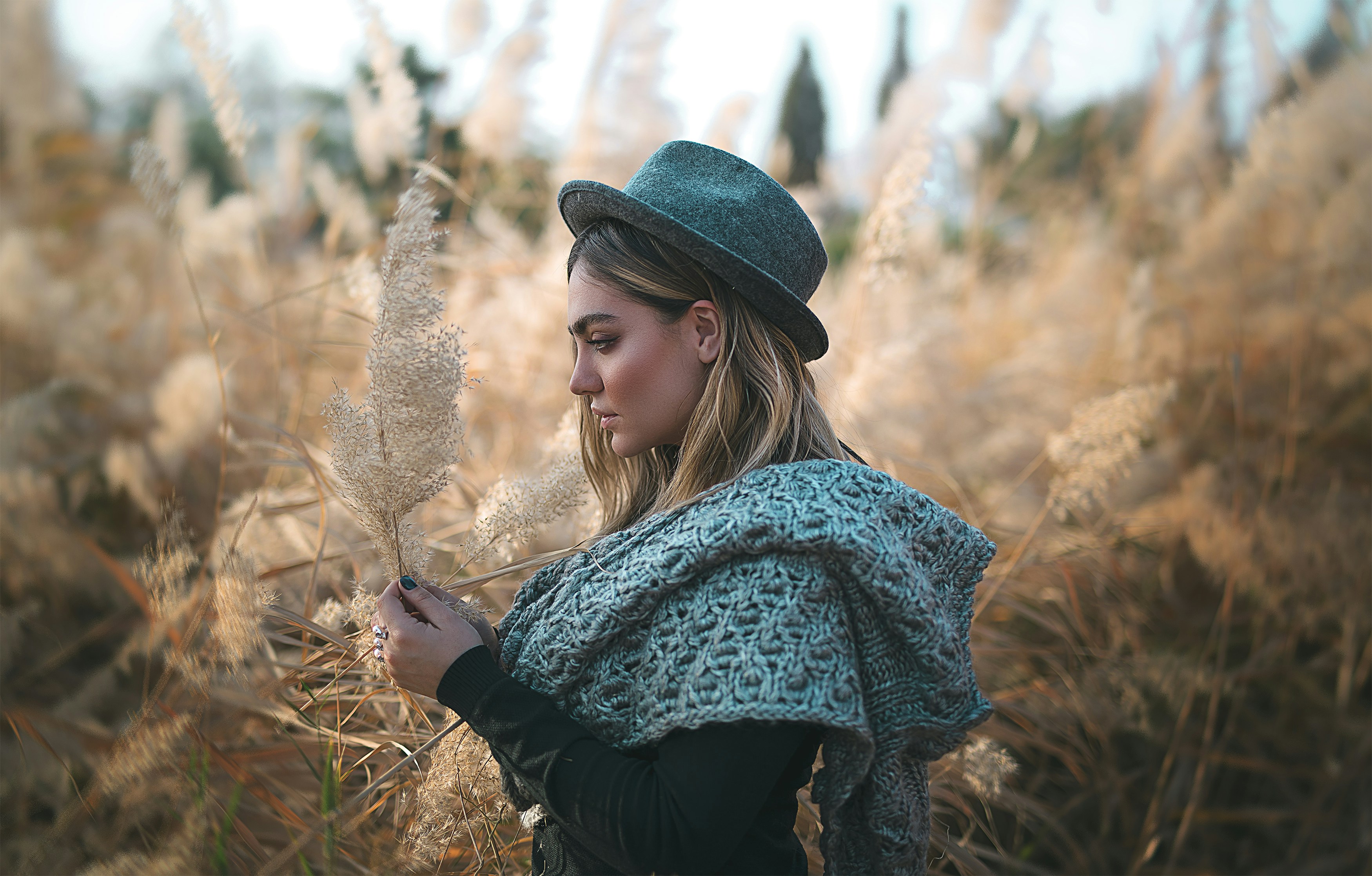 Woman Standing Among Pampas Grass