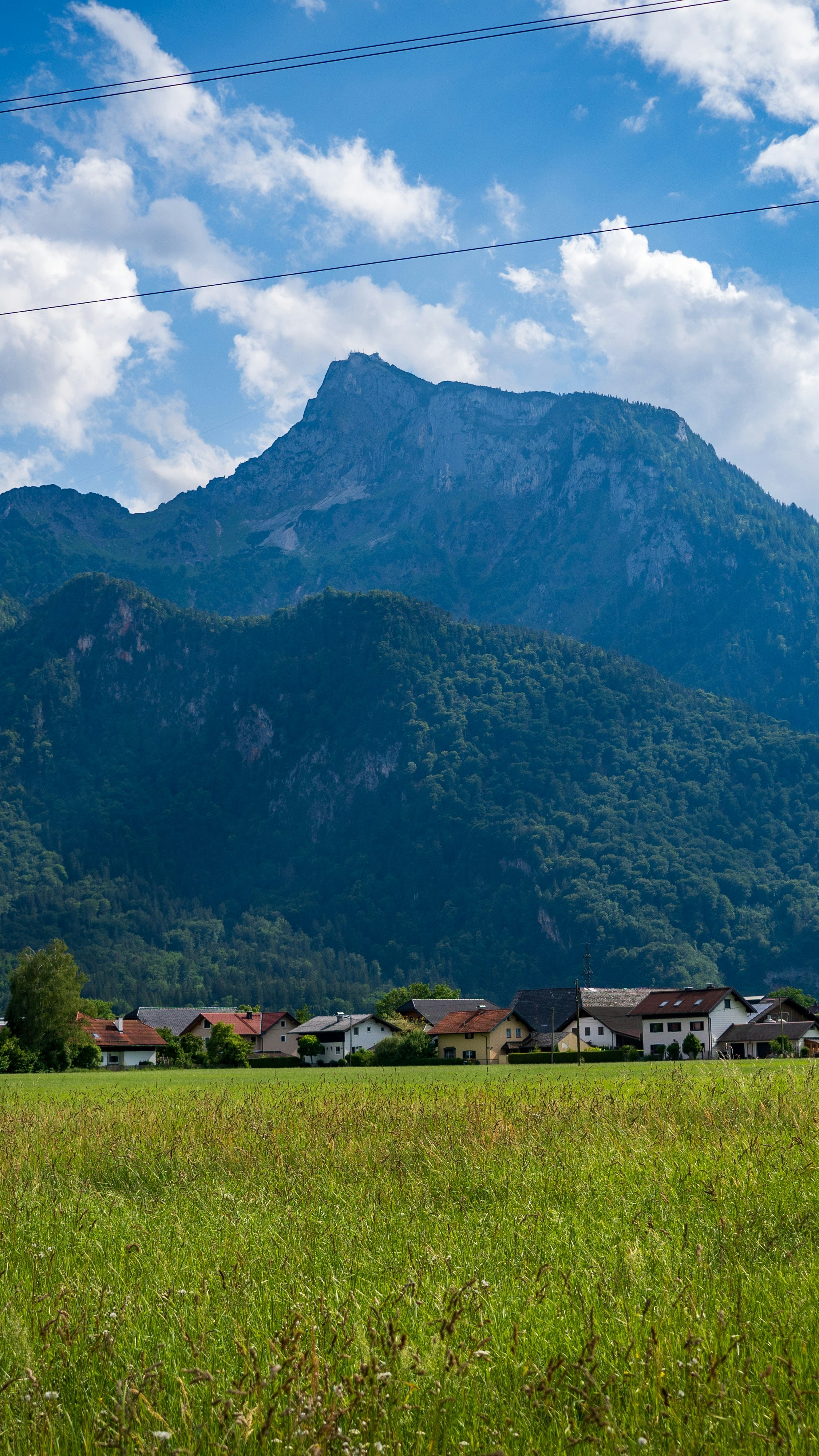 Alpine Village Under Mountain Peak