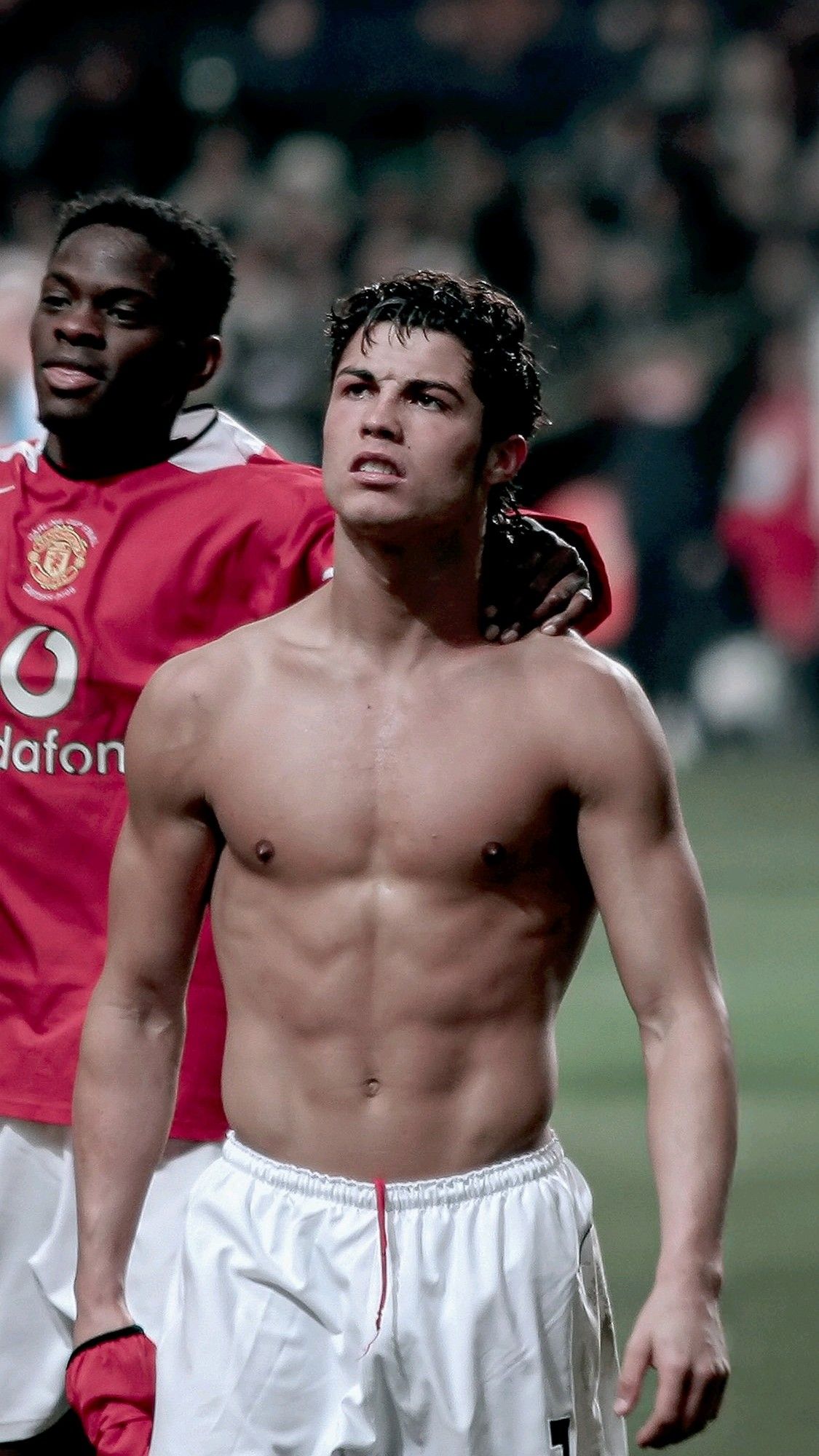 Young Shirtless Cristiano Ronaldo on Soccer Field
