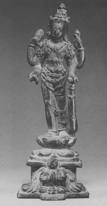 Ancient Four-Armed Deity Statue