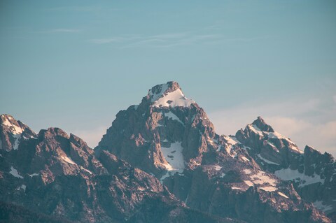Snow-capped Mountain Peak Under Clear Sky