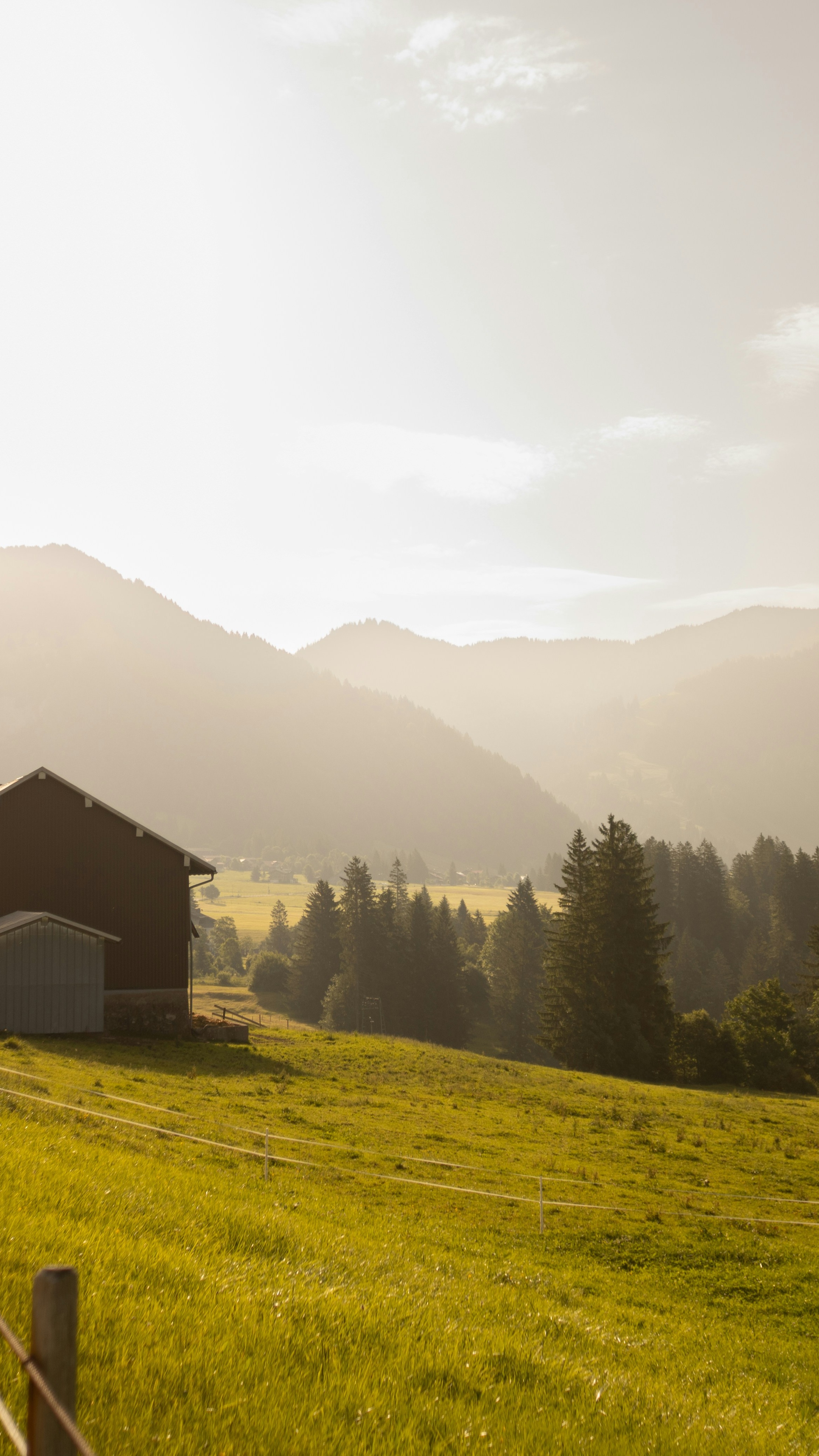 Sunlit Mountain Countryside Farm