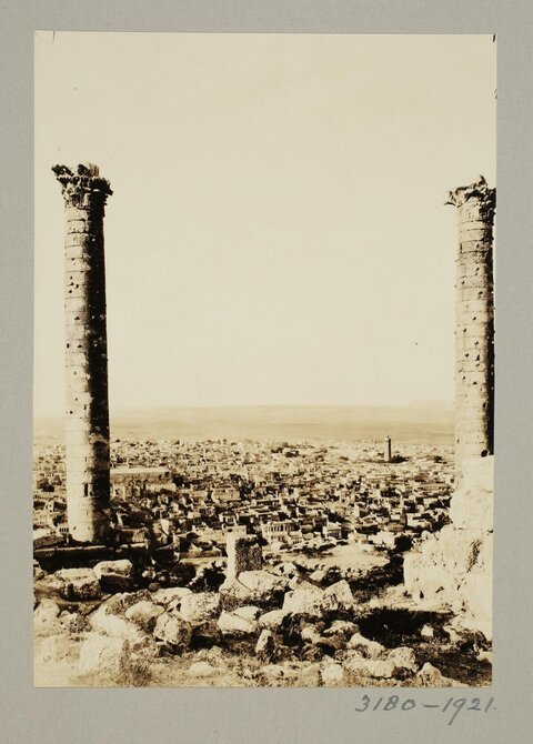 Ancient Ruins Overlooking City