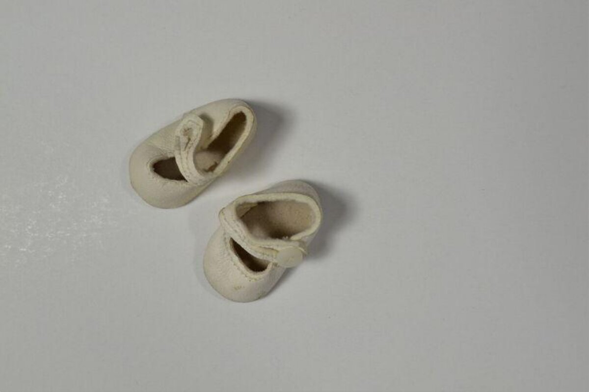 Pair of Off-white Baby Shoes