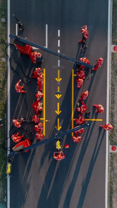 Aerial View of F1 Pit Stop Crew