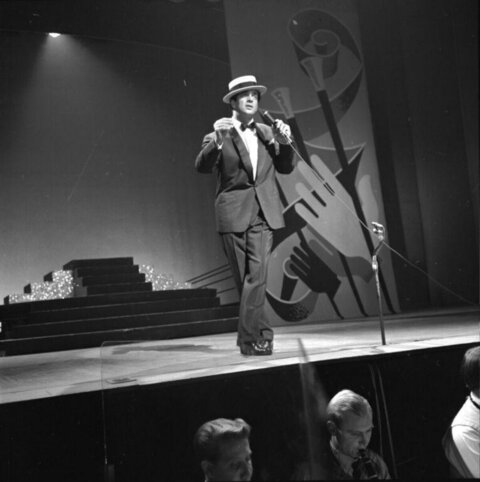 Male Singer Performing on Stage