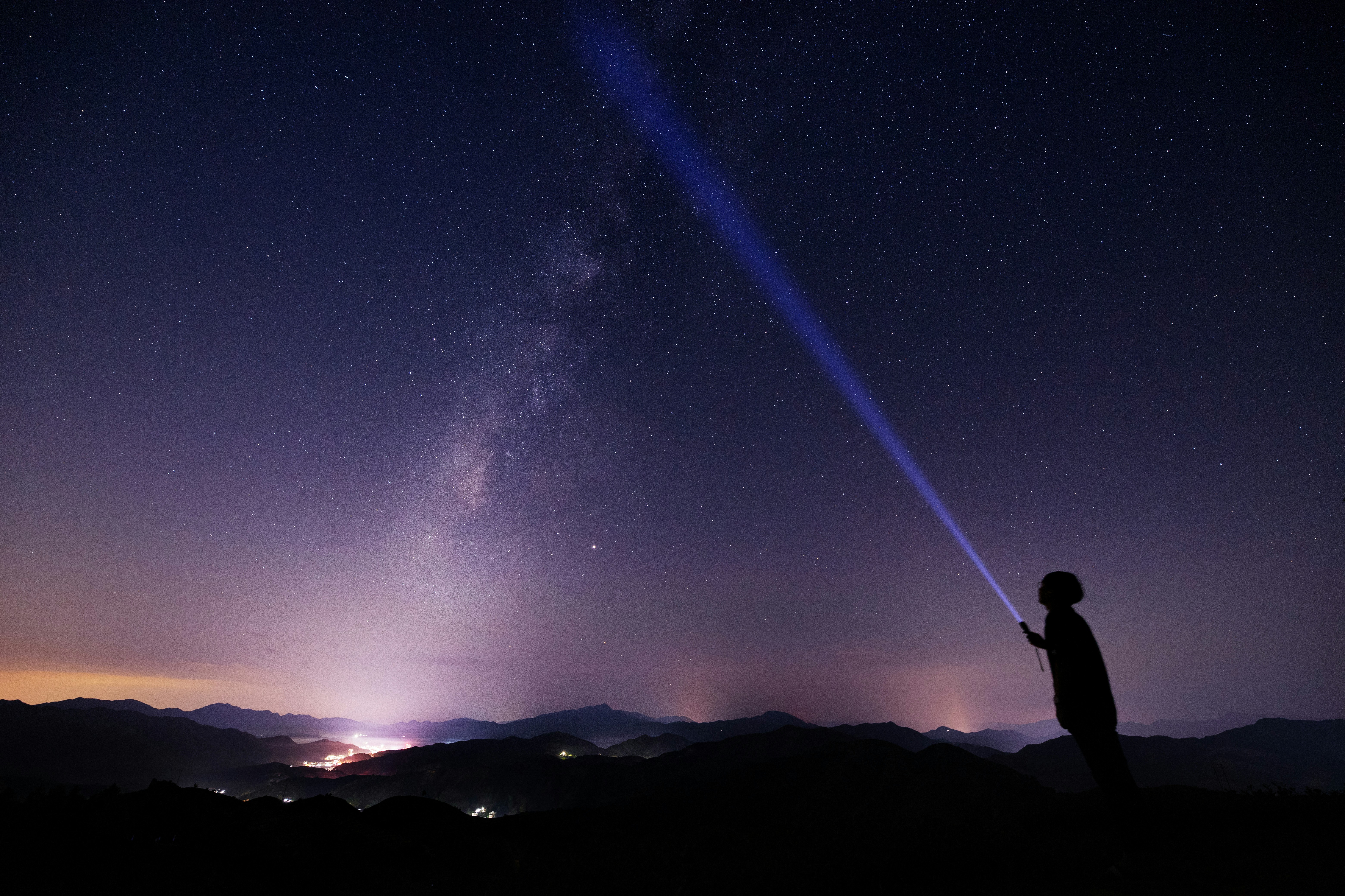 Stargazer Under Mountain Starry Sky