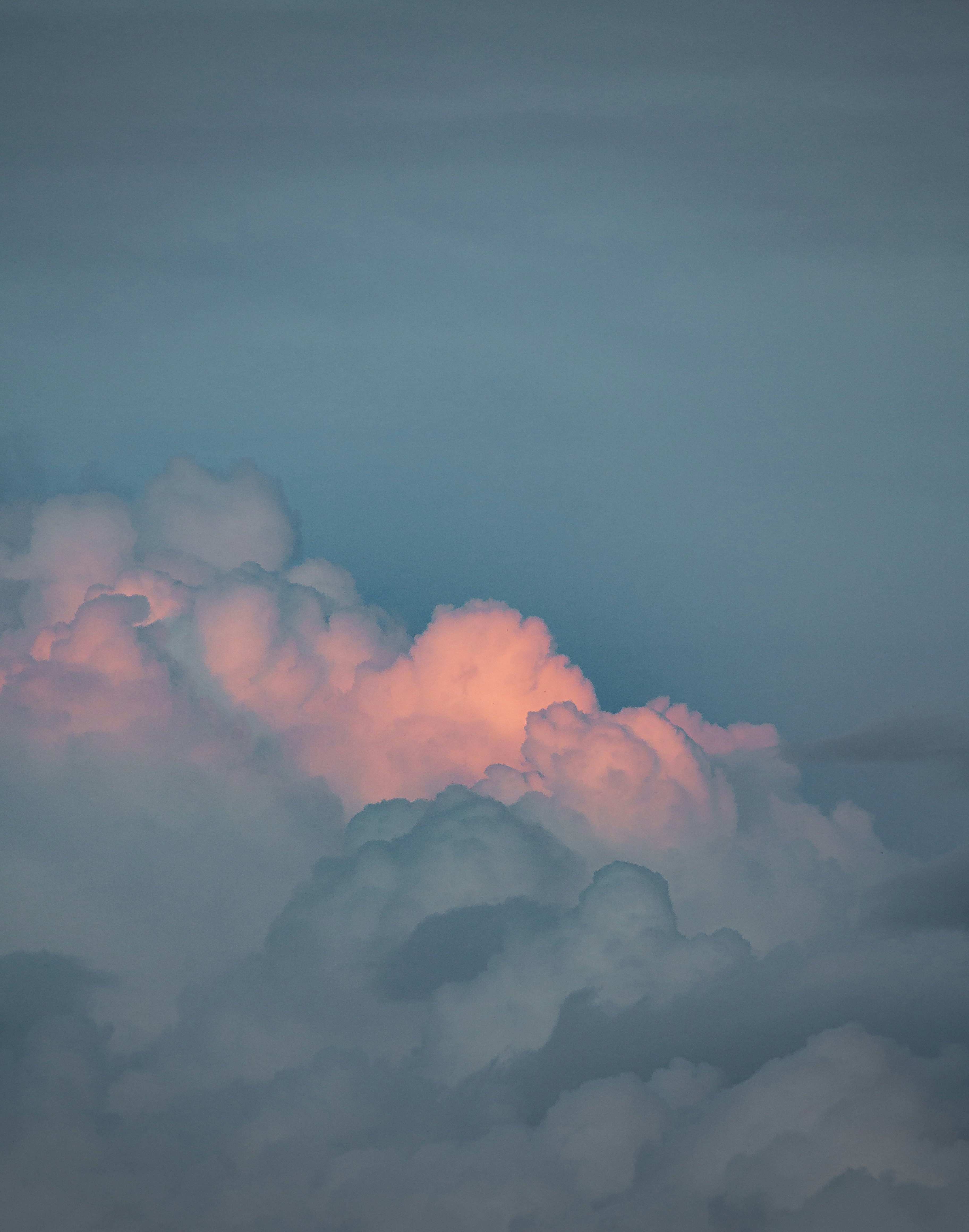 Pink Clouds Against Blue Sky