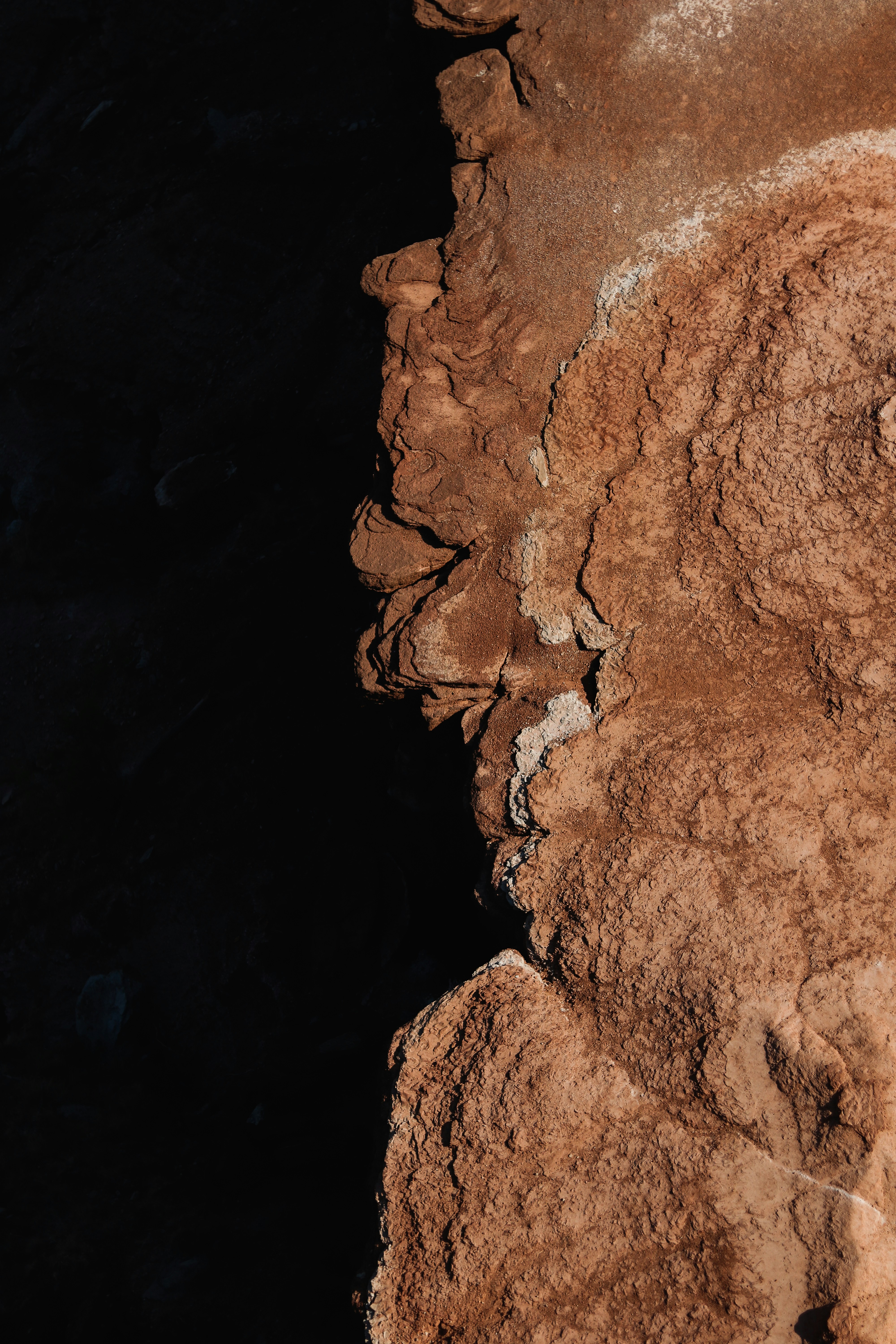 Sunlit Red Rock Cliff Edge