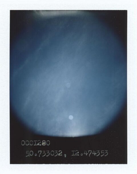 Blue Sky Shot With Coordinates Text