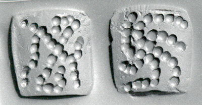 Spherical Pellets Forming N and S