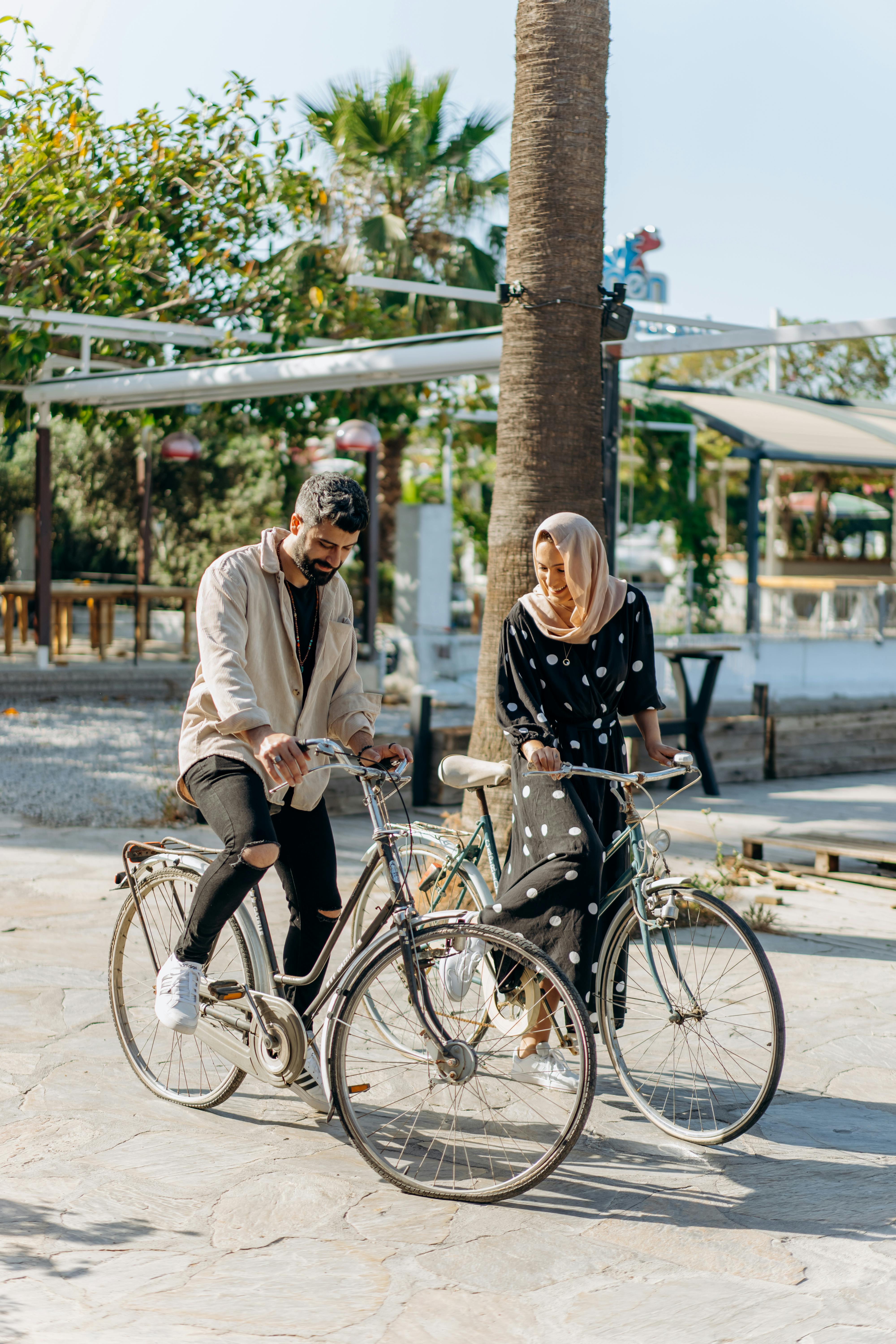 Couple Riding Bicycles Outdoors