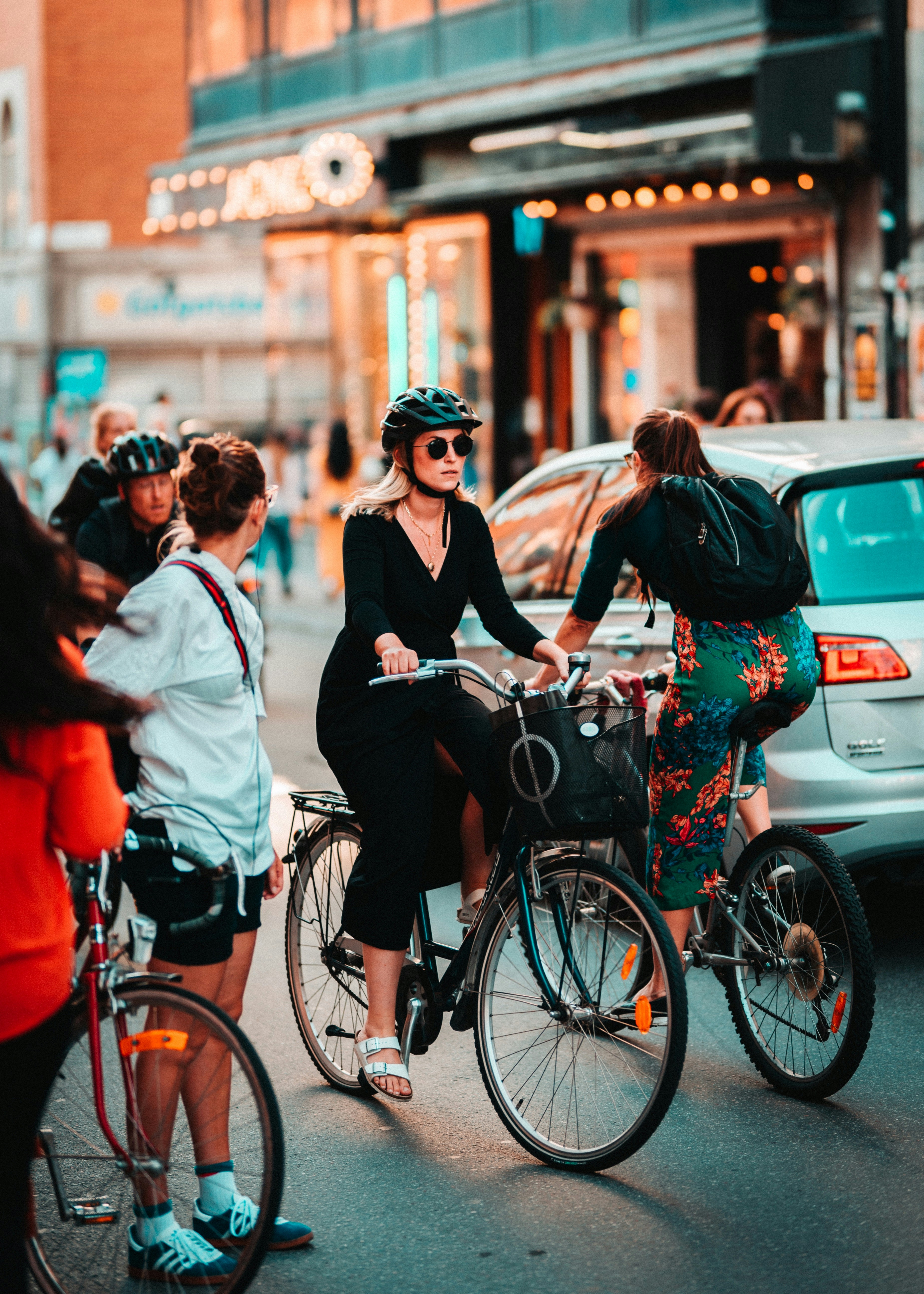 Group of Cyclists Waiting on Urban Street