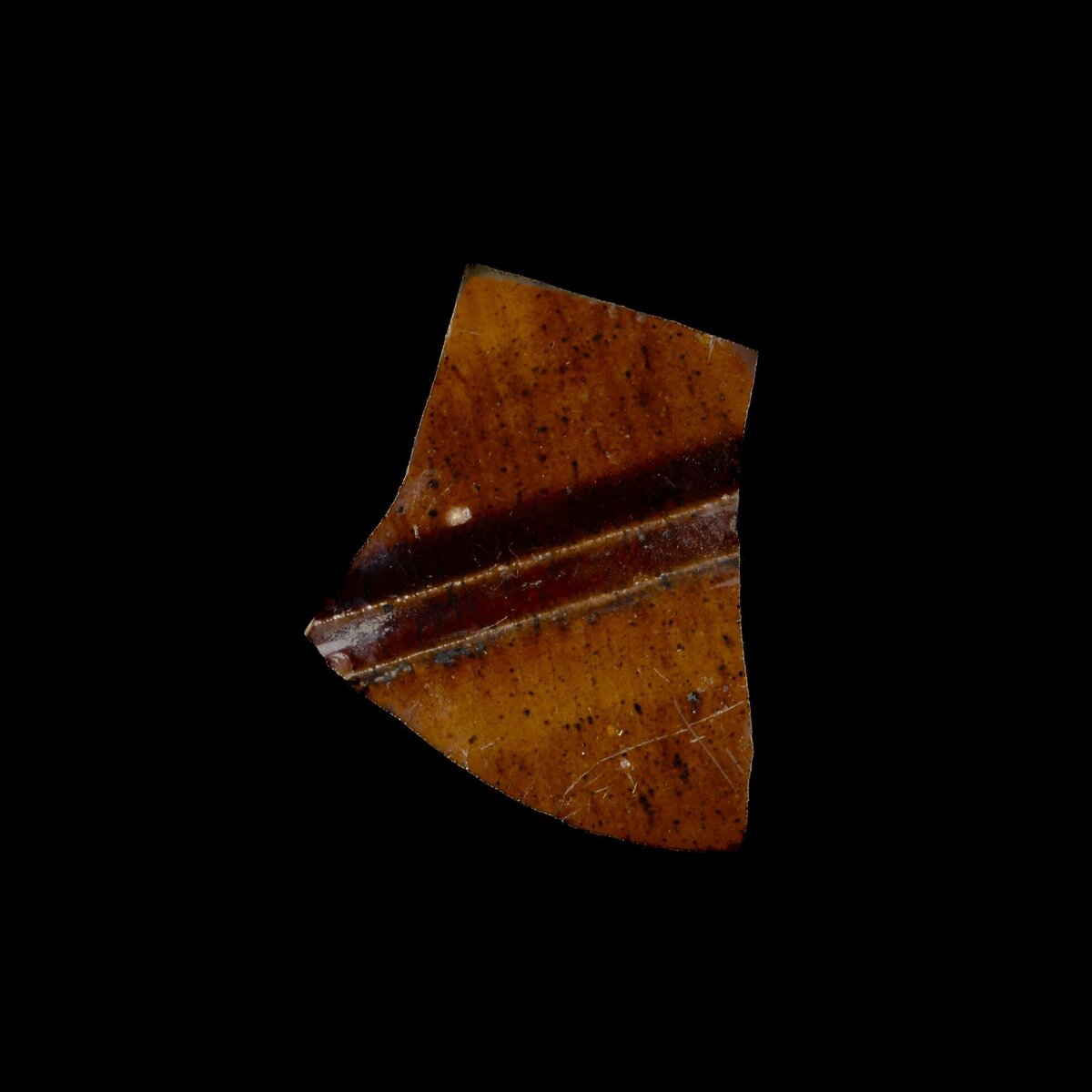Fragment of Brown Glazed Pottery