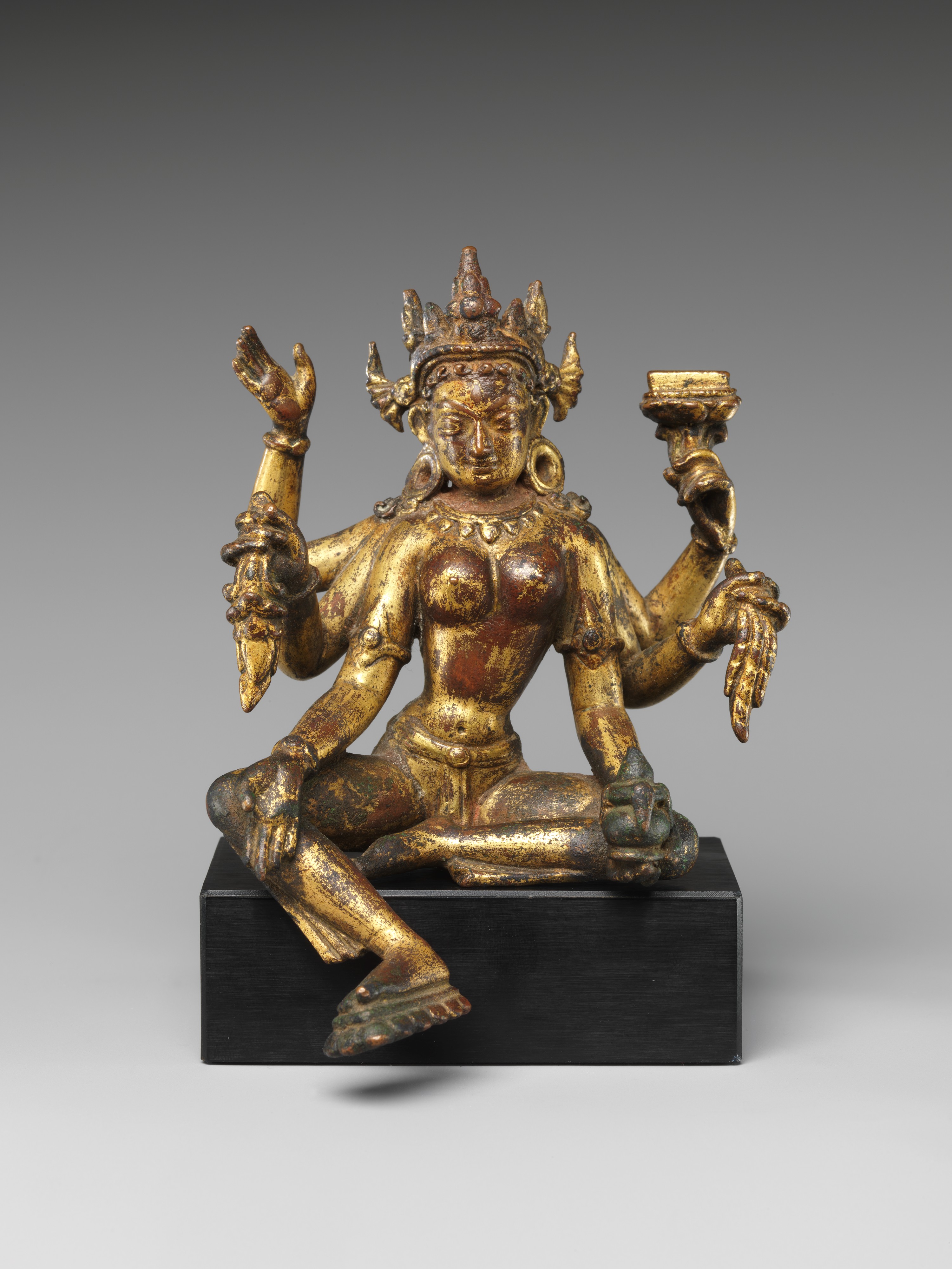Ancient Gilded Four-Armed Bronze Statue