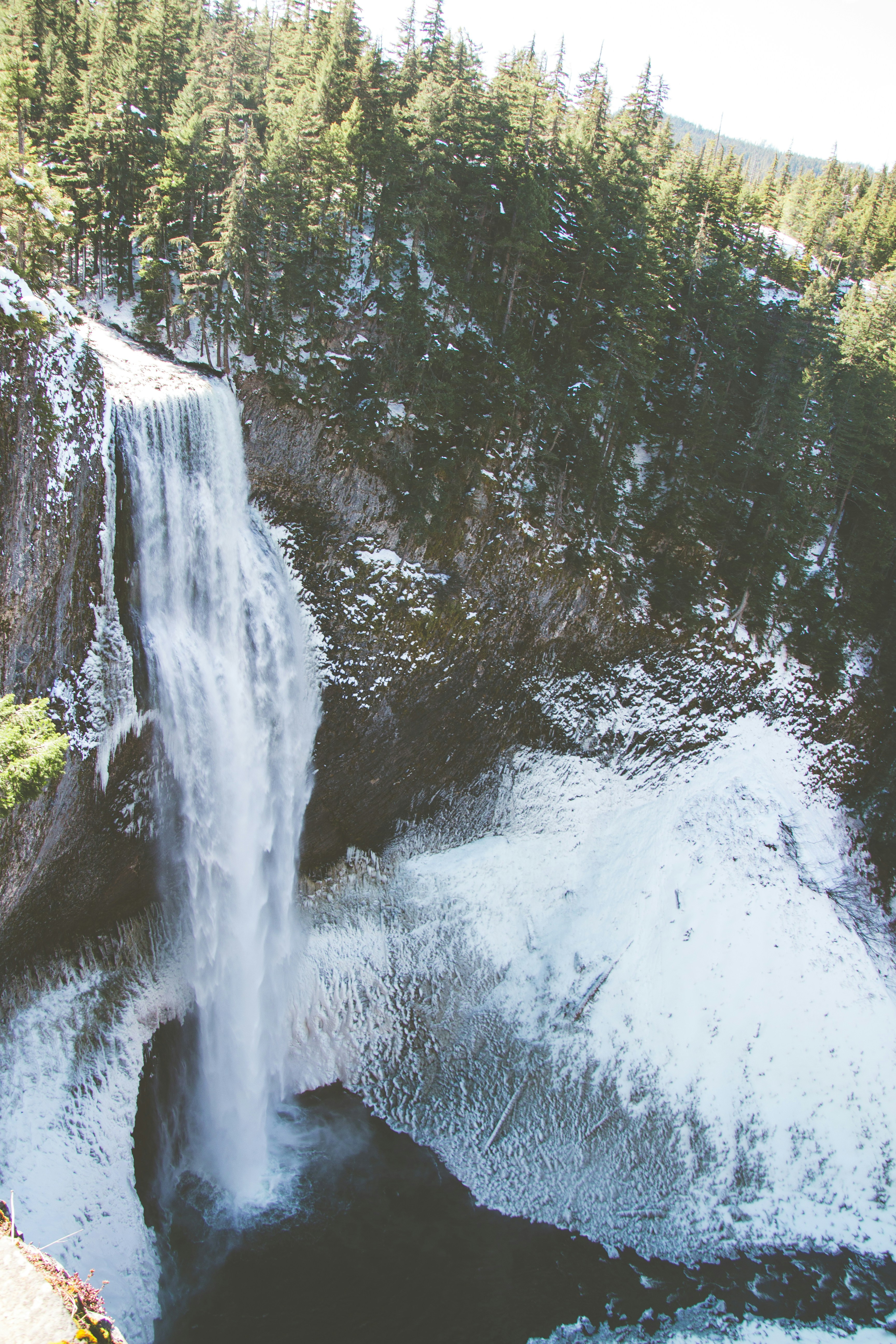 Snow-covered Forest Waterfall