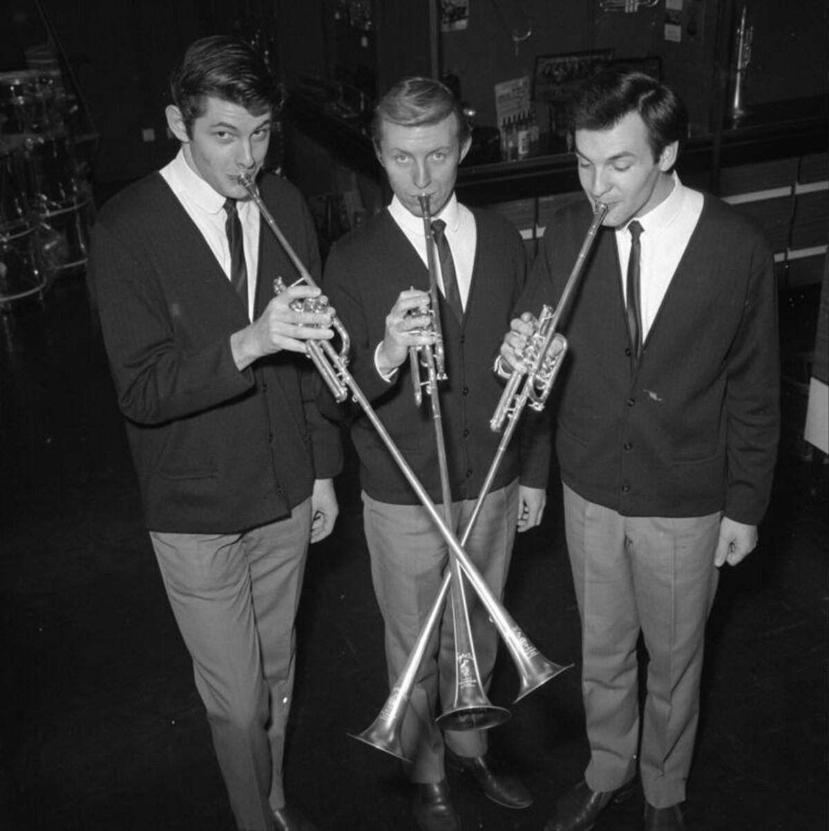 Three Trumpeters with Crossed Trumpets