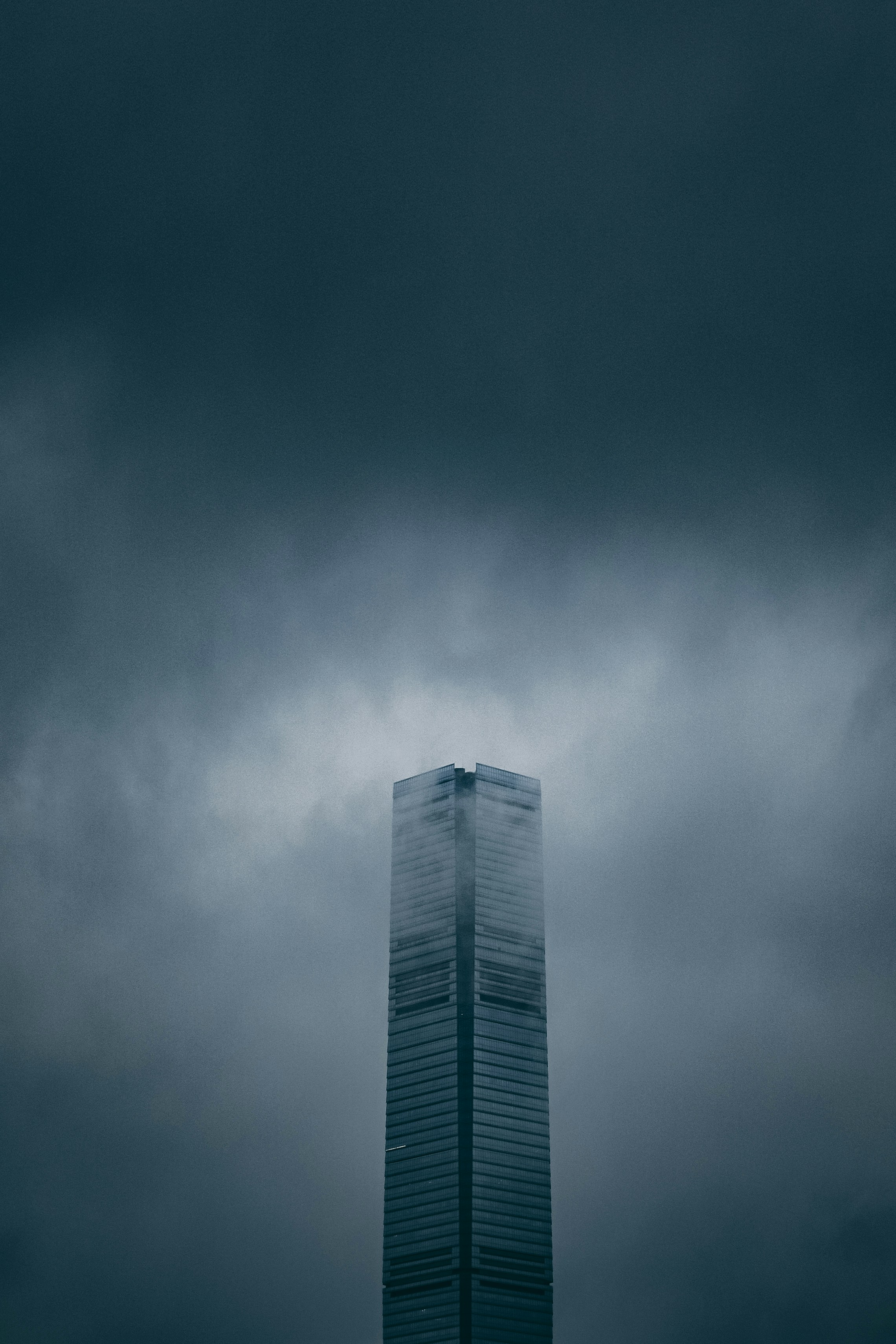 Supertall Skyscraper in Foggy Sky