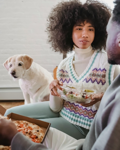 Casual Meal With Dog At Home