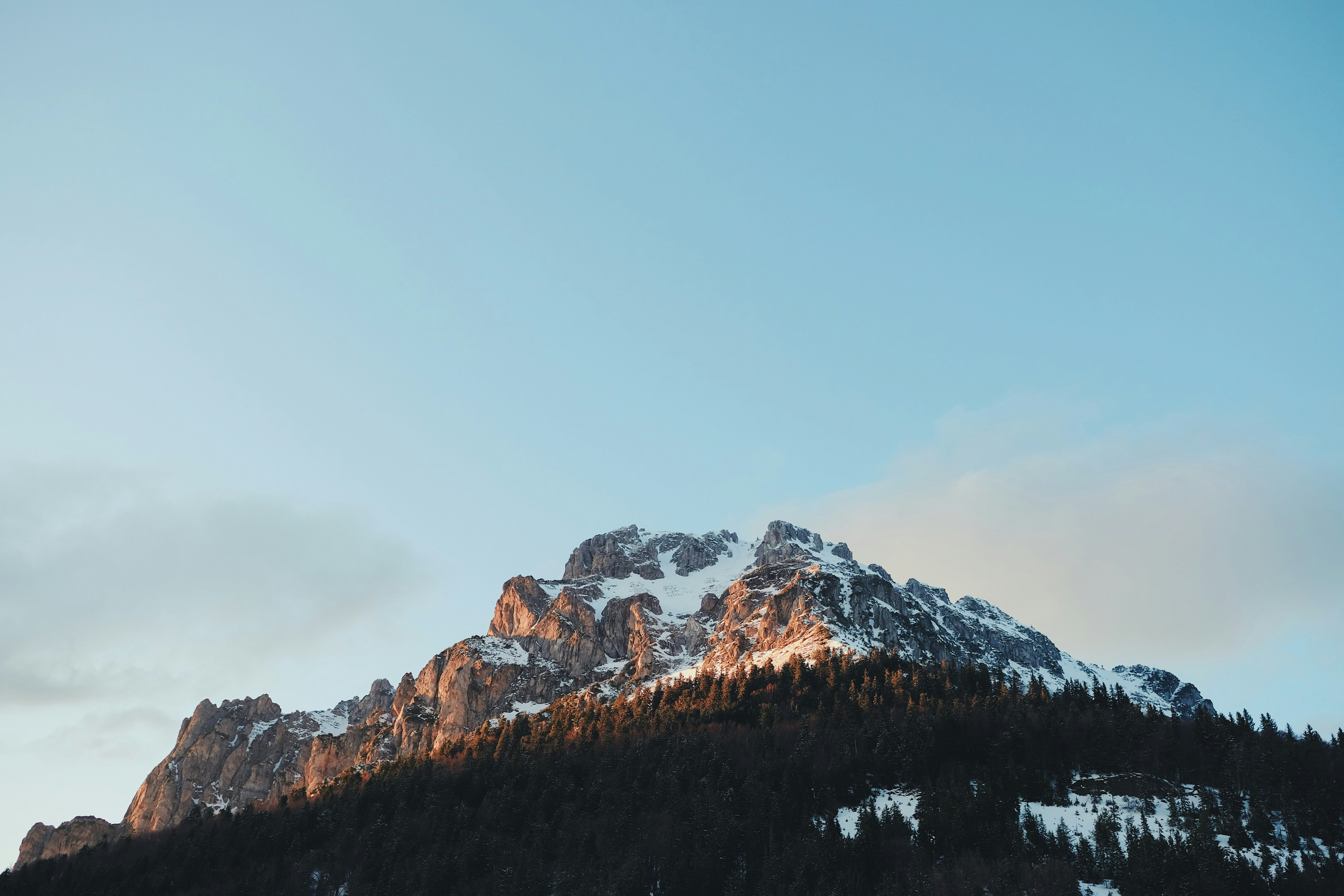 Sunlit Snow-capped Mountain Peak