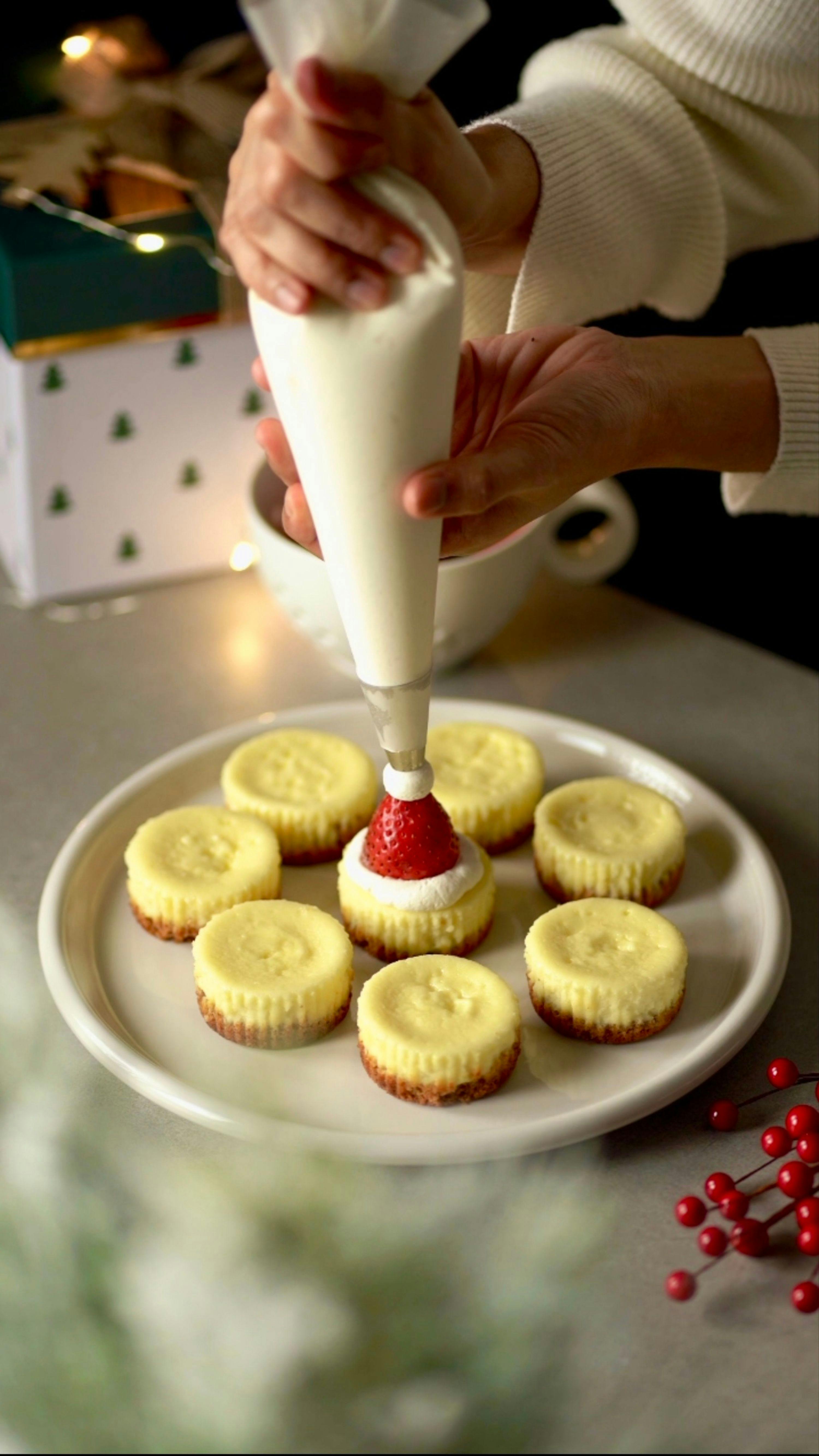 Decorating Santa Hat Mini Cheesecakes