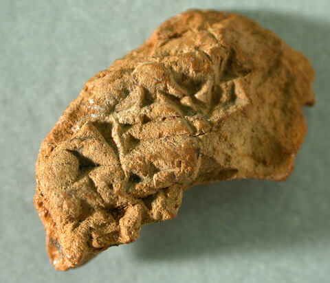 Broken Inscribed Clay Fragment
