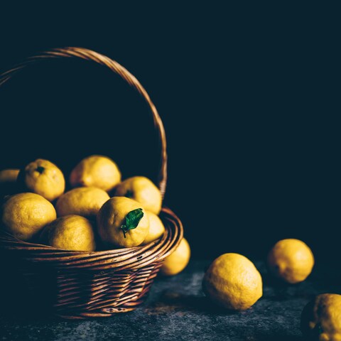 Fresh Lemons in Wicker Basket