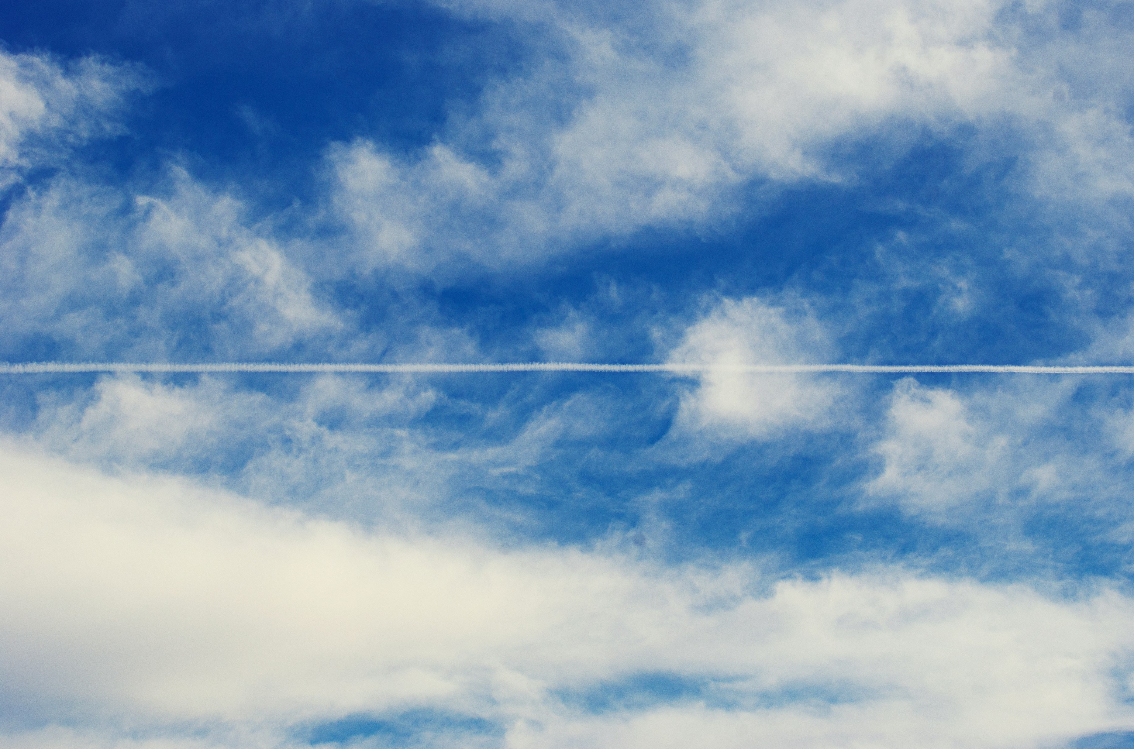 Blue Sky with Airplane Contrail