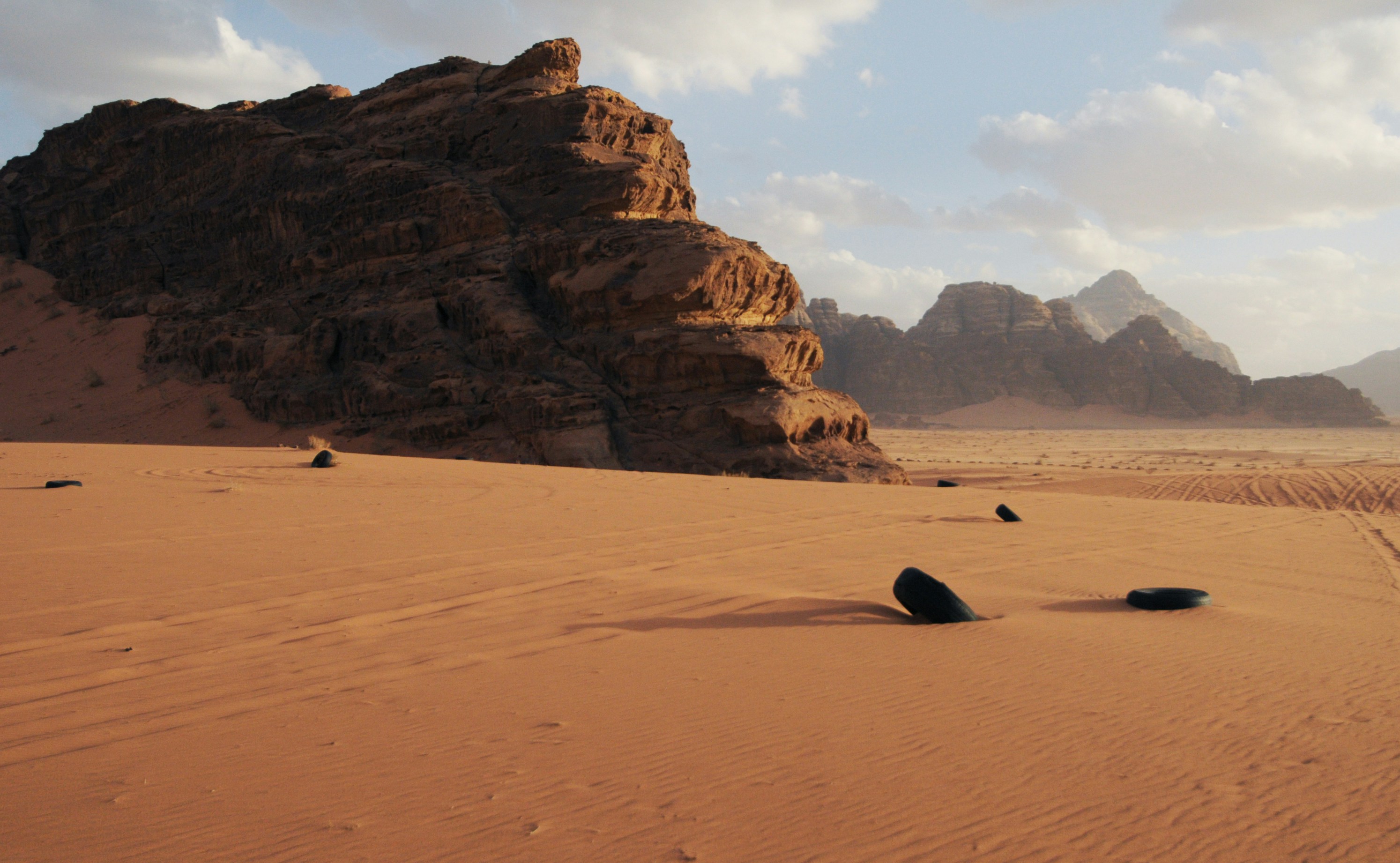 Desert Landscape With Discarded Tires