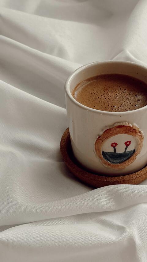 Frothy Coffee in Handmade Mug