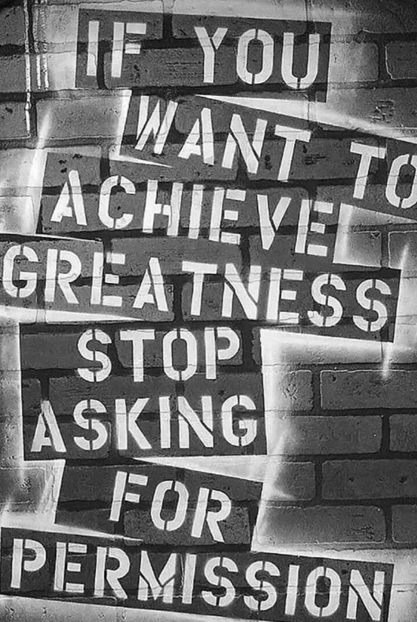 Motivational Quote on Brick Wall