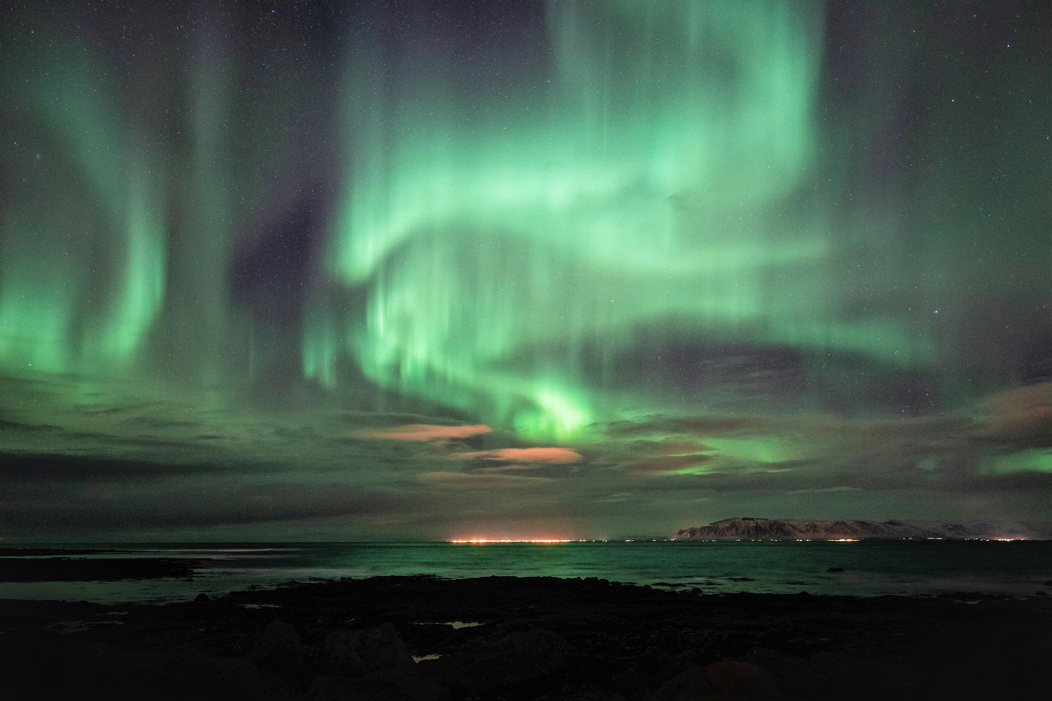 Northern Lights Over Coastal Sea