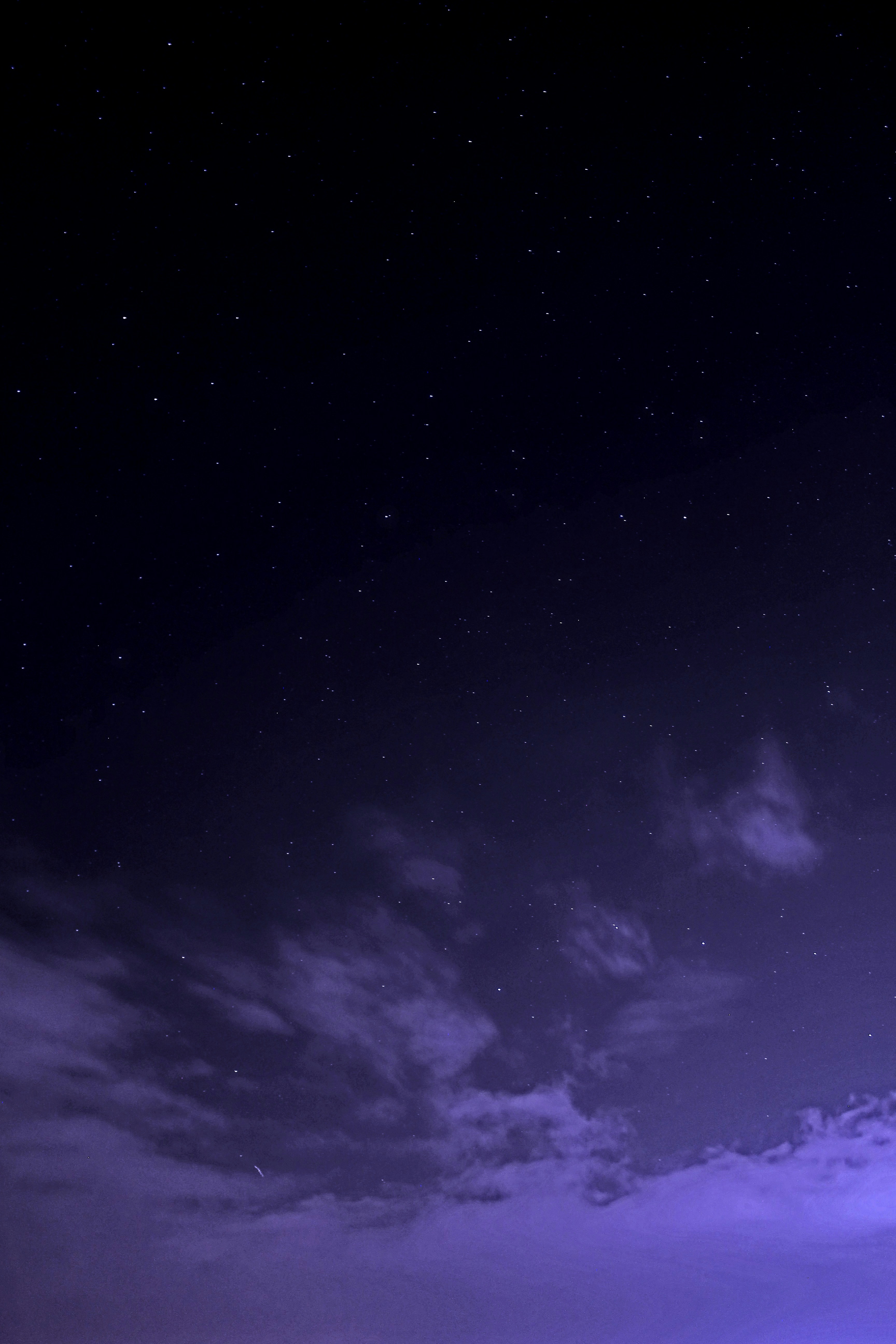 Starry Night Sky With Clouds