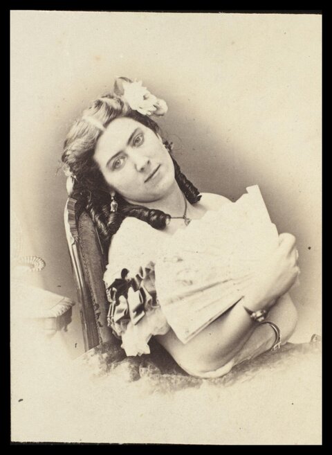 Vintage Portrait of Woman Holding Fan