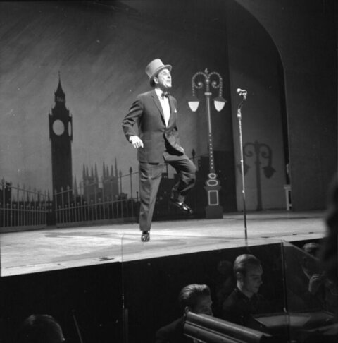 Male Performer Performing on Theater Stage